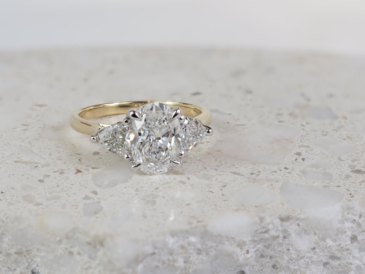 18ct Yellow and White Gold Oval and Trilliant Lab-Grown Diamond Engagement Ring, 2.03ct Centre
