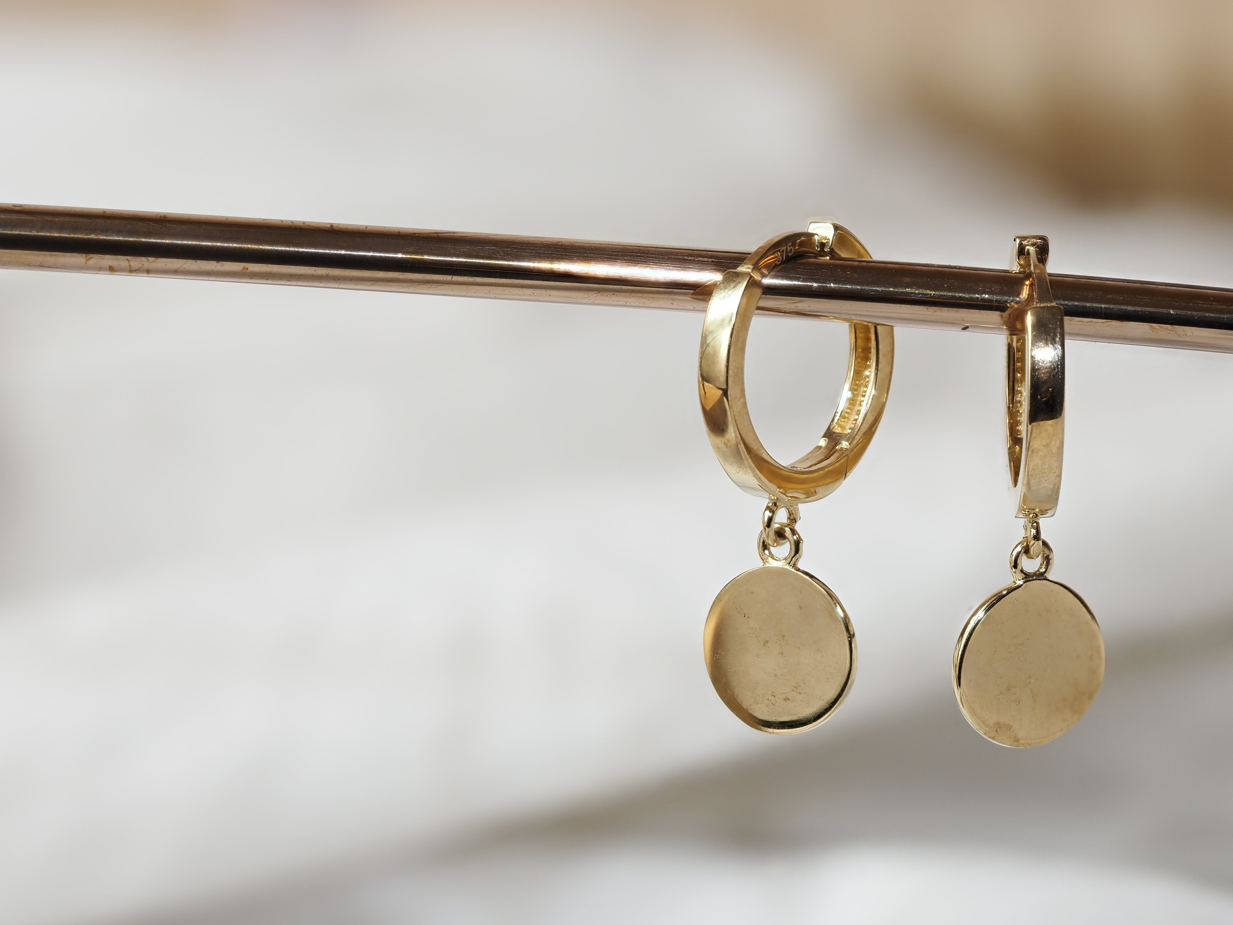 9ct Yellow Gold Huggie With Dropping Disc
