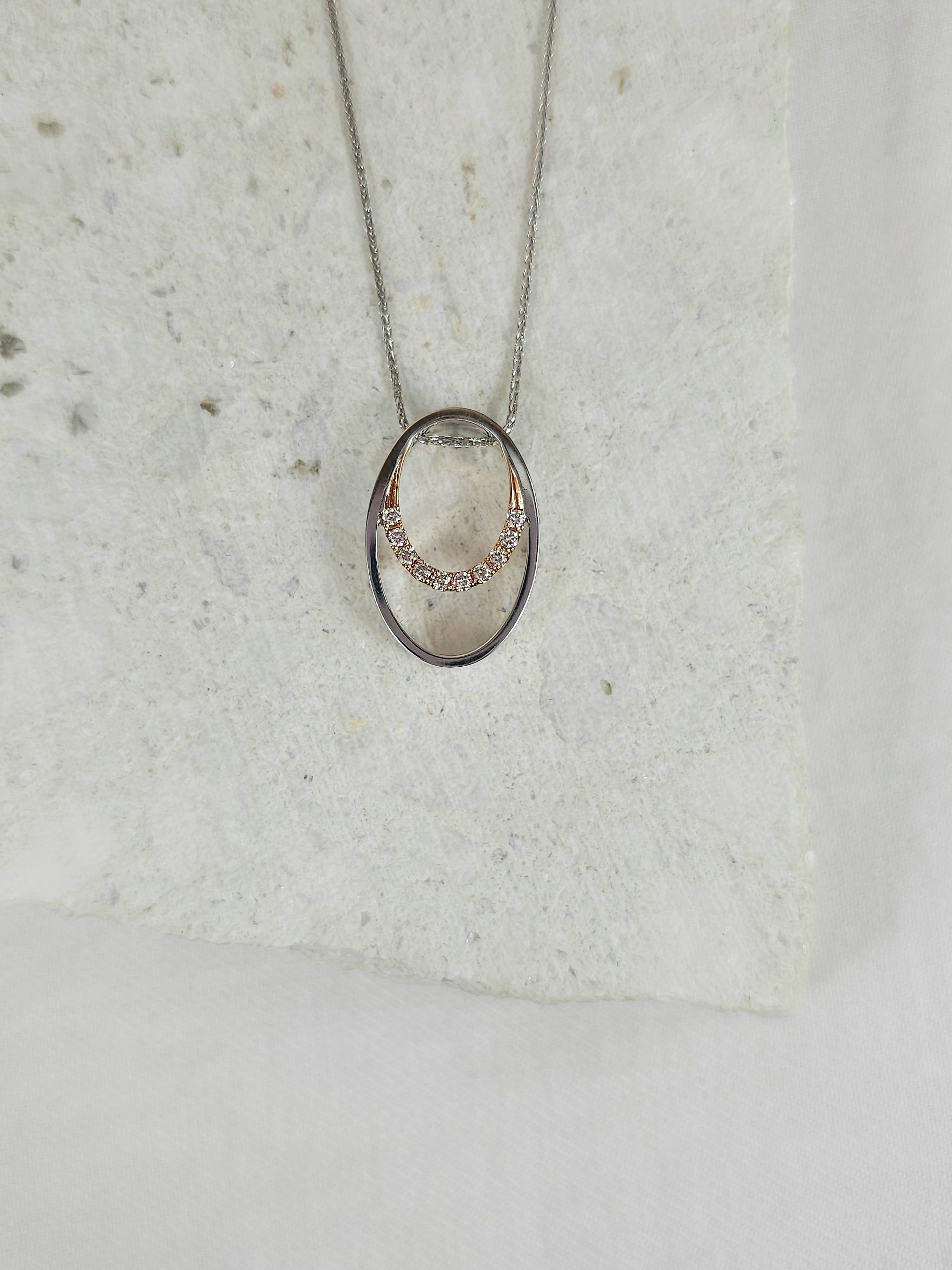 18 carat Rose & White Gold Argyle Pink Diamond Circle Pendant