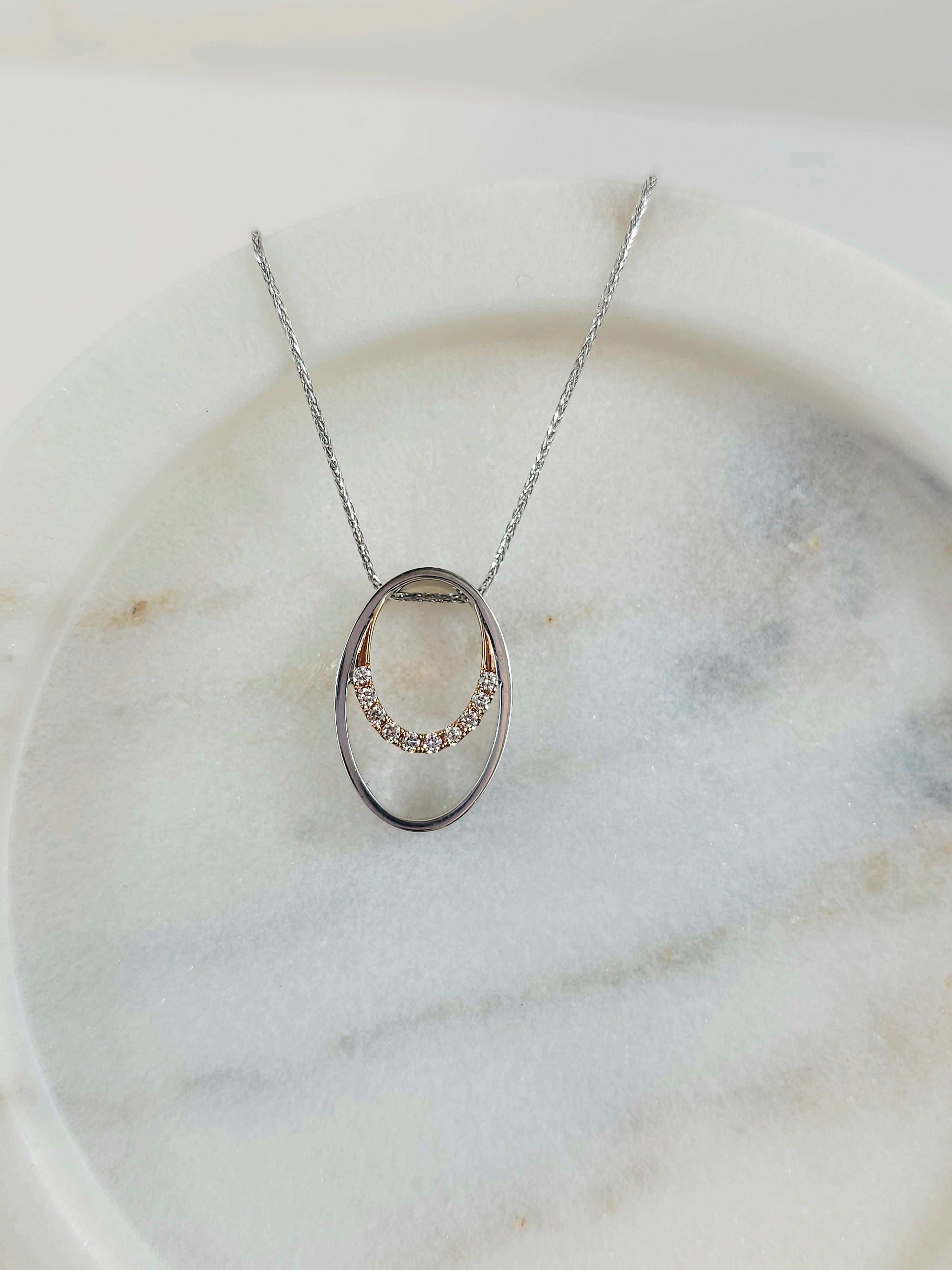 18 carat Rose & White Gold Argyle Pink Diamond Circle Pendant