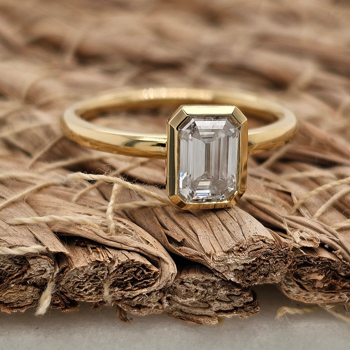 18ct Yellow Gold Emerald Cut Moissanite Solitaire.