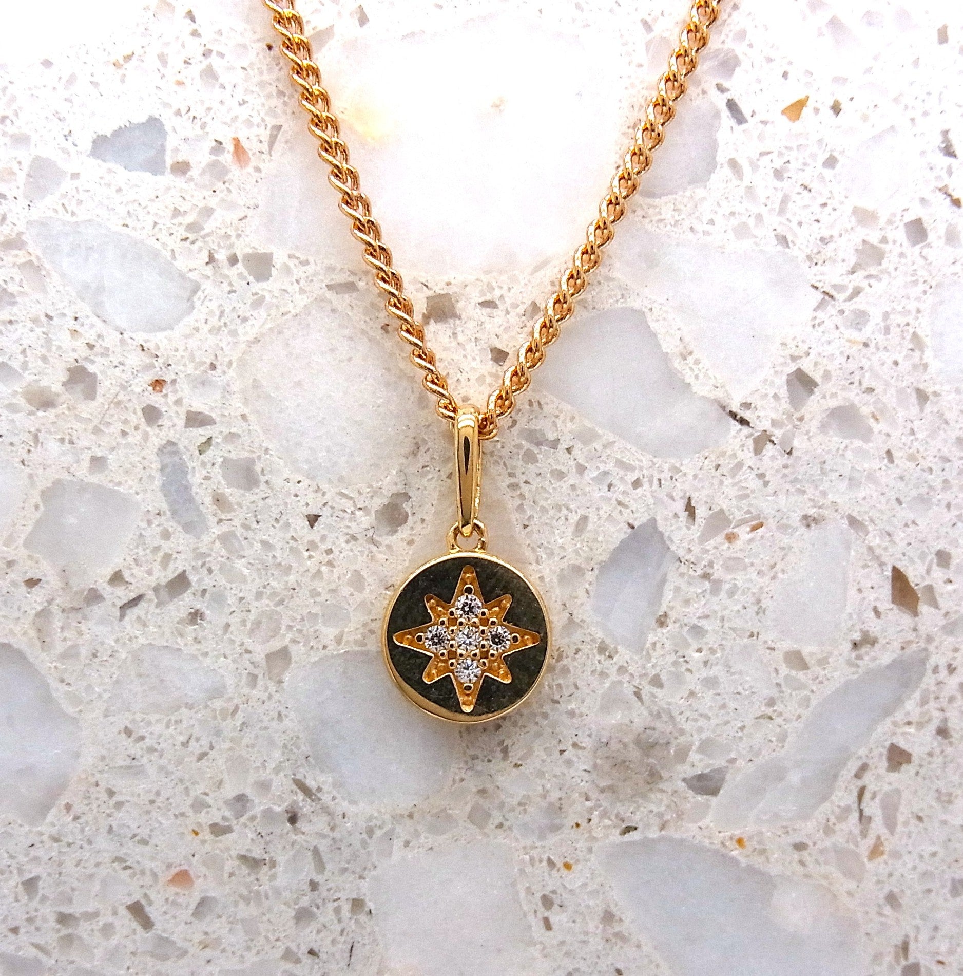 9ct star set cubic zirconia disc pendant