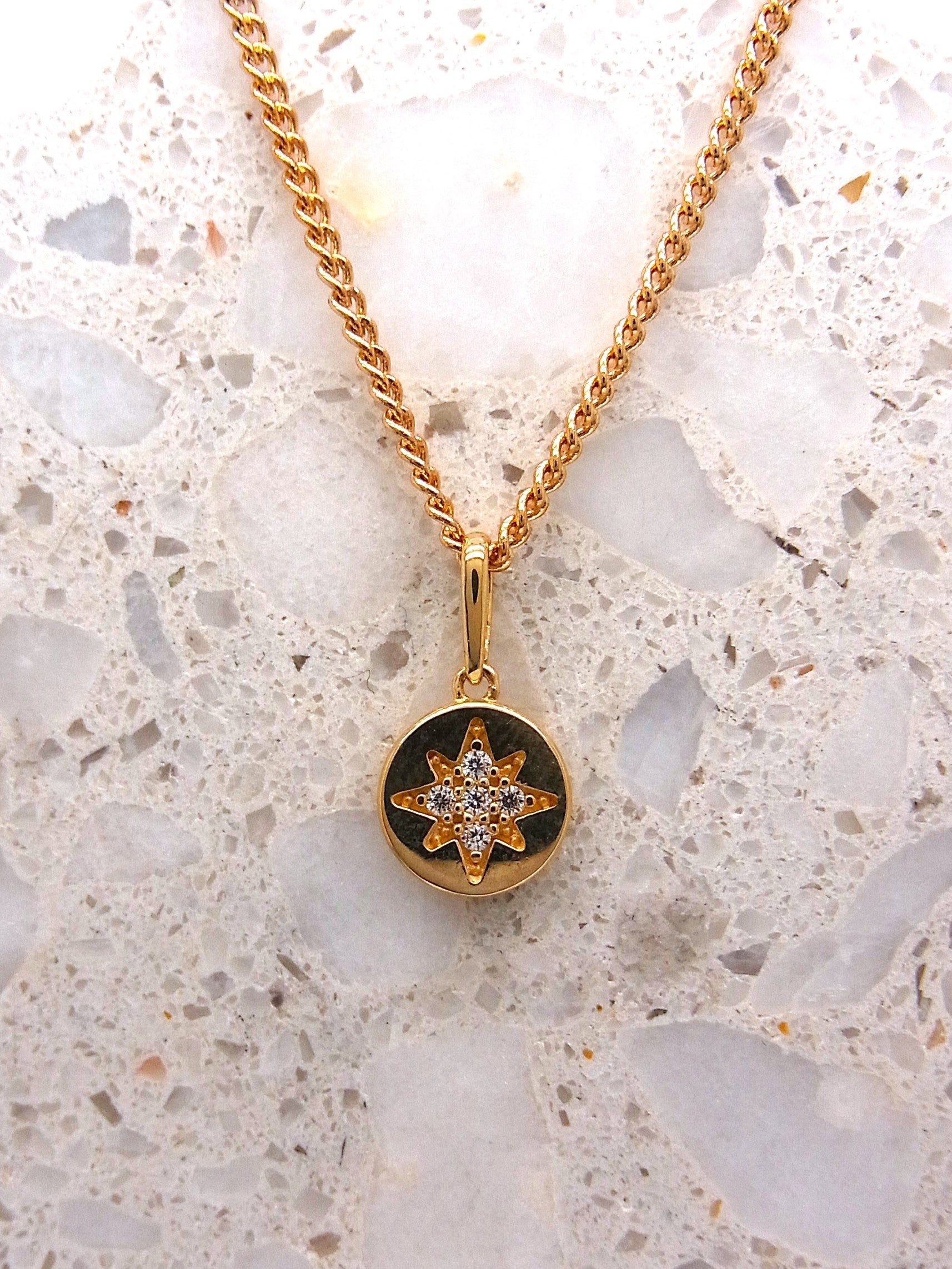 9ct star set cubic zirconia disc pendant