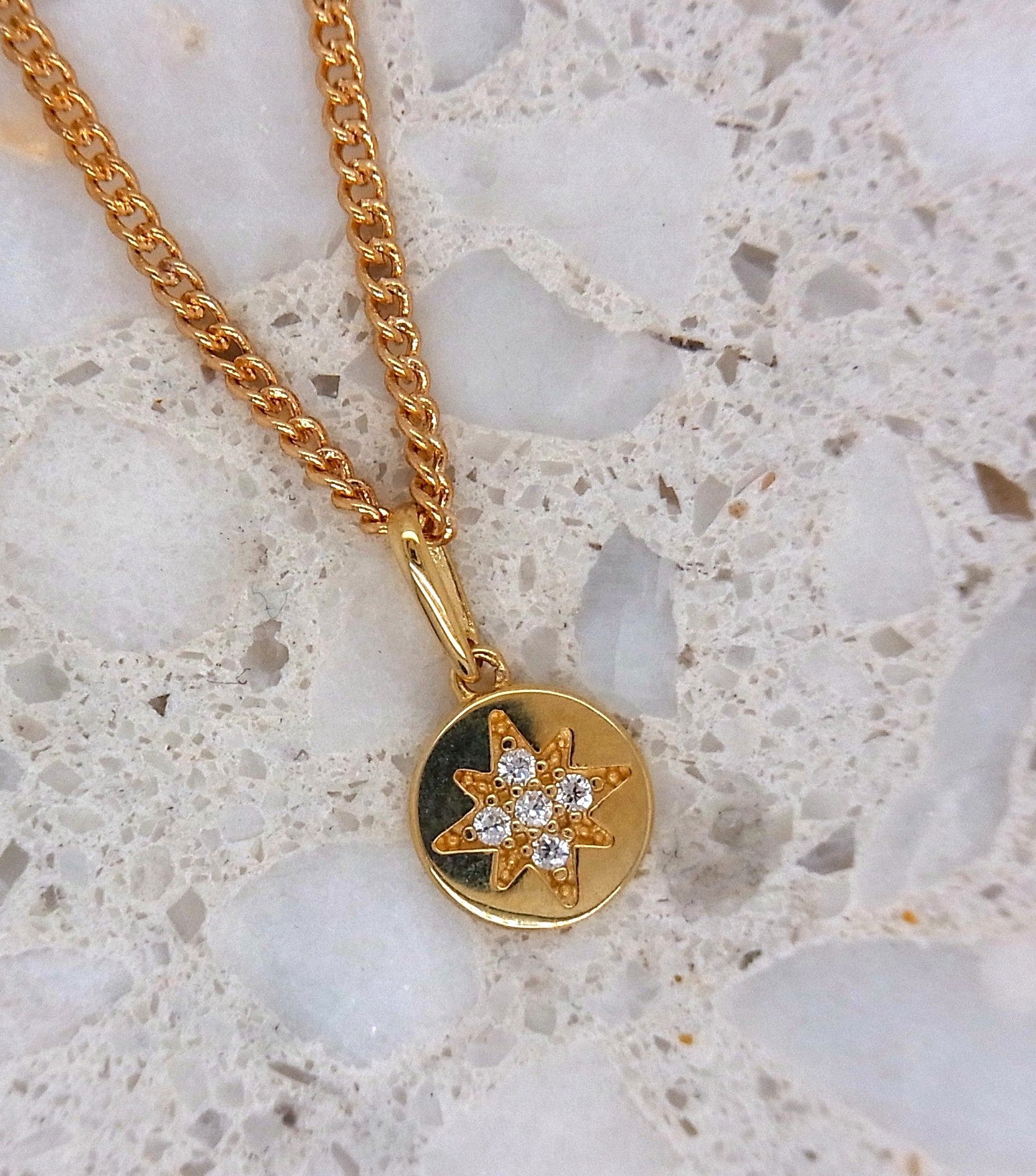 9ct star set cubic zirconia disc pendant