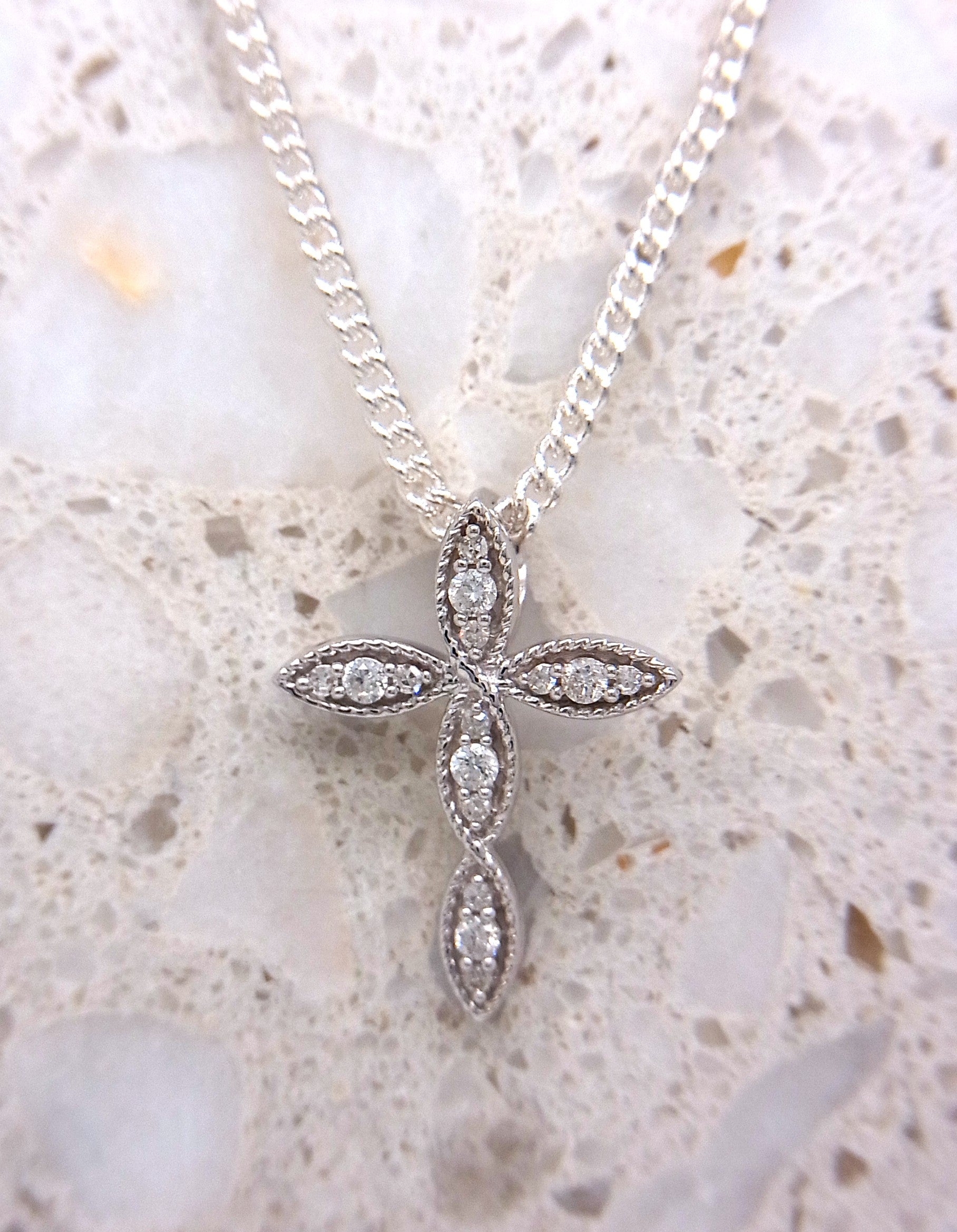 9ct white gold 0.10ct diamond millgrain cross pendant