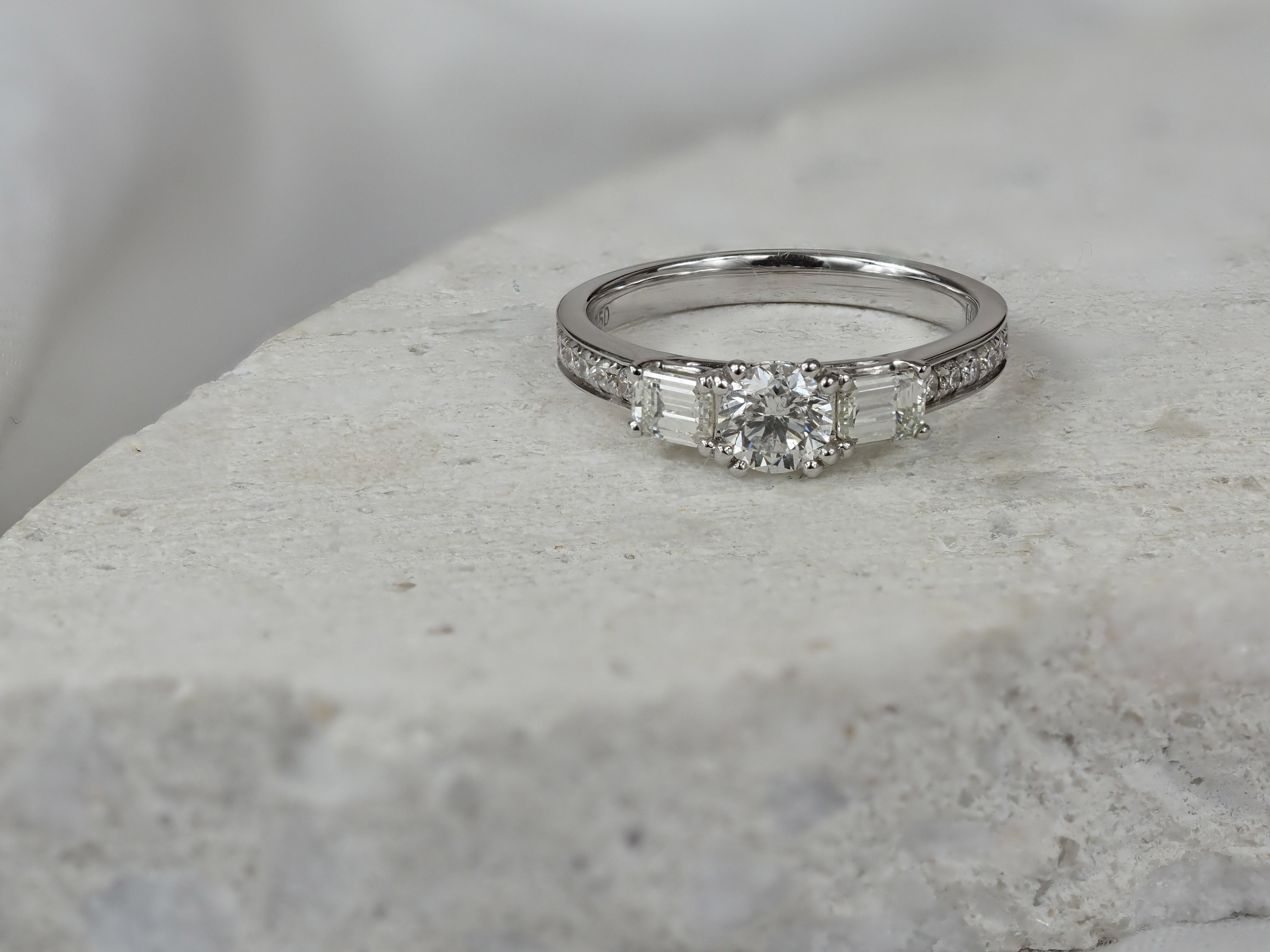 18ct White Gold Round and Emerald Cut Diamond Engagement Ring, 0.40ct Centre