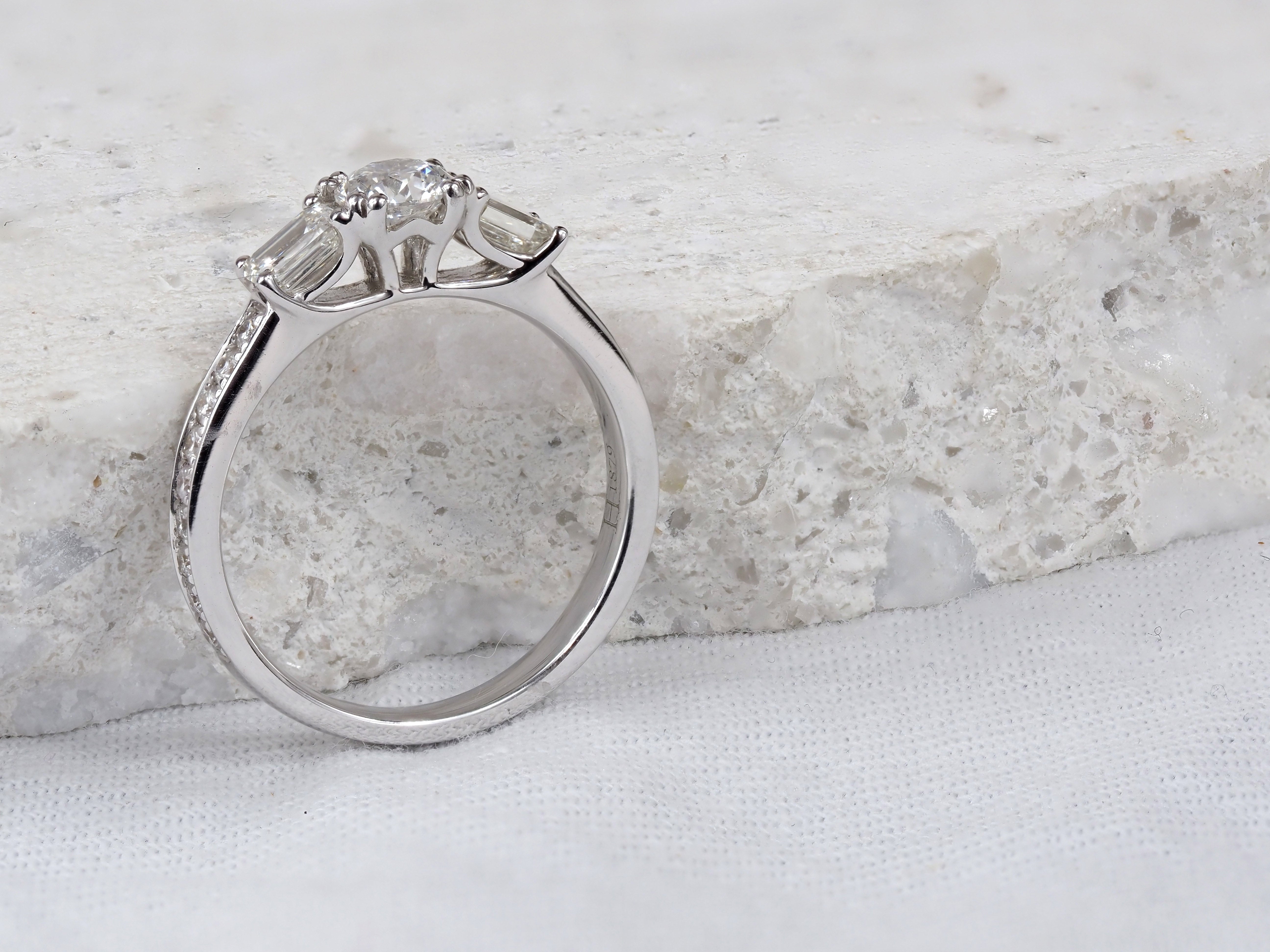 18ct White Gold Round and Emerald Cut Diamond Engagement Ring, 0.40ct Centre