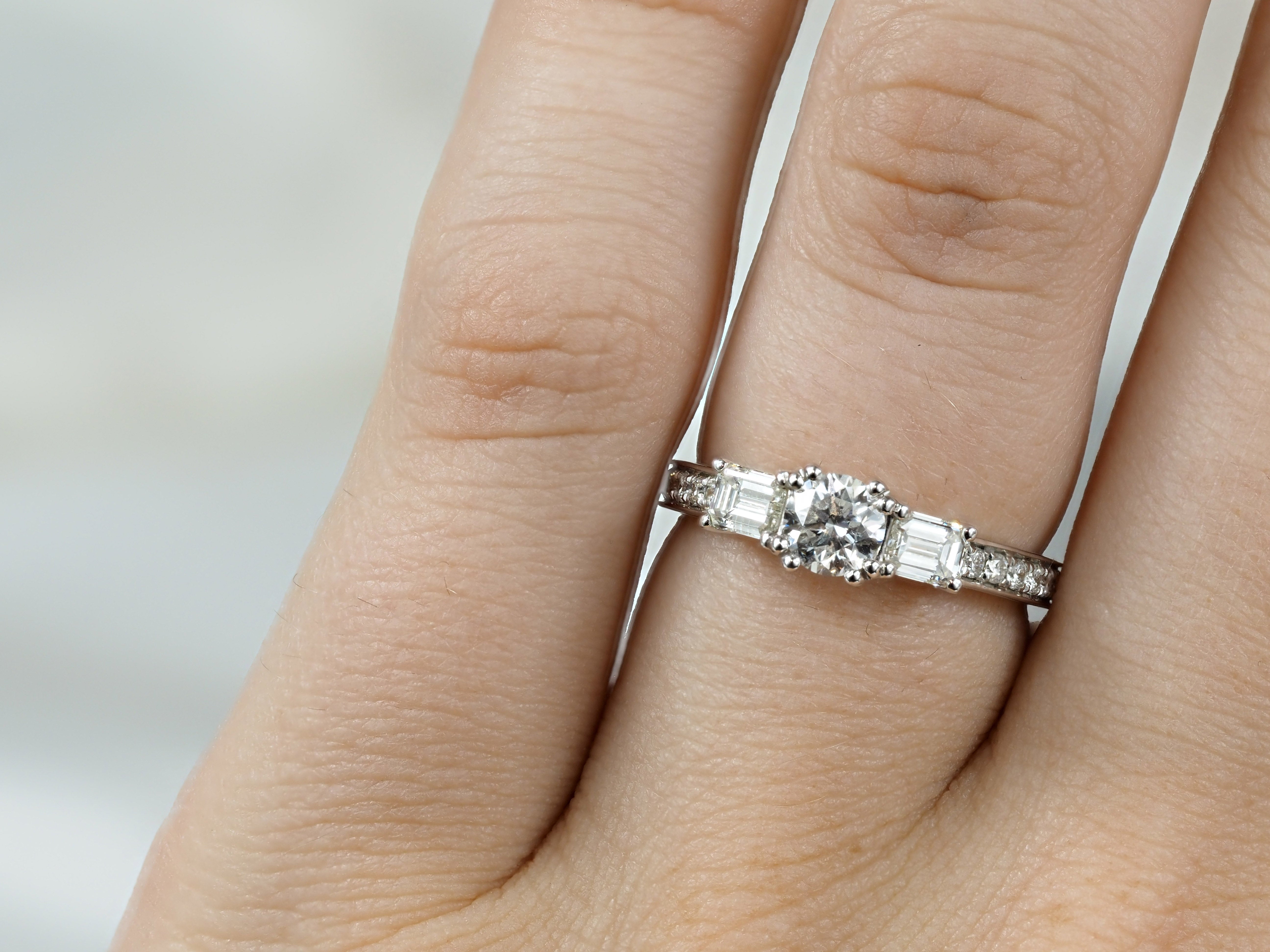 18ct White Gold Round and Emerald Cut Diamond Engagement Ring, 0.40ct Centre