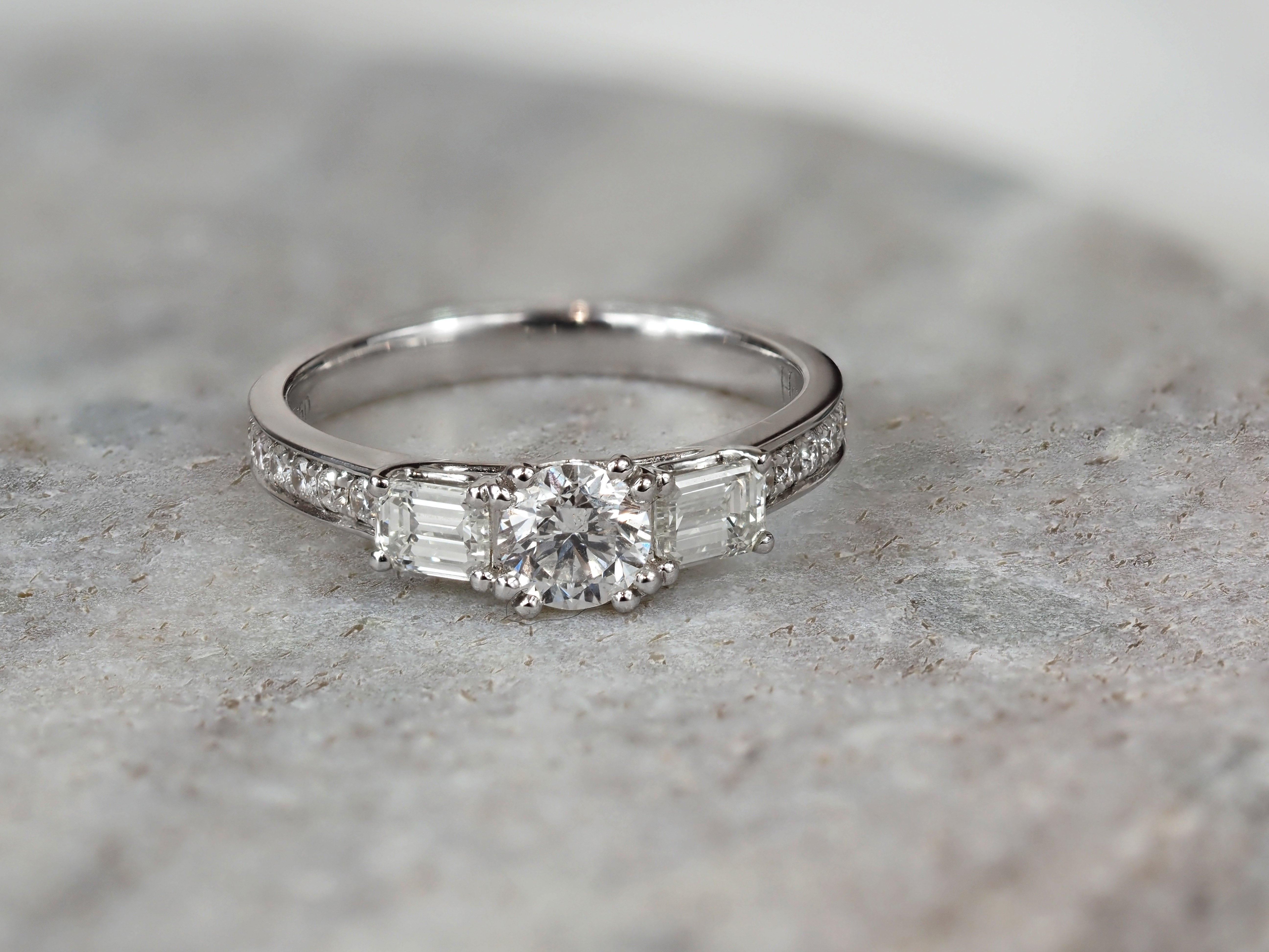18ct White Gold Round and Emerald Cut Diamond Engagement Ring, 0.40ct Centre