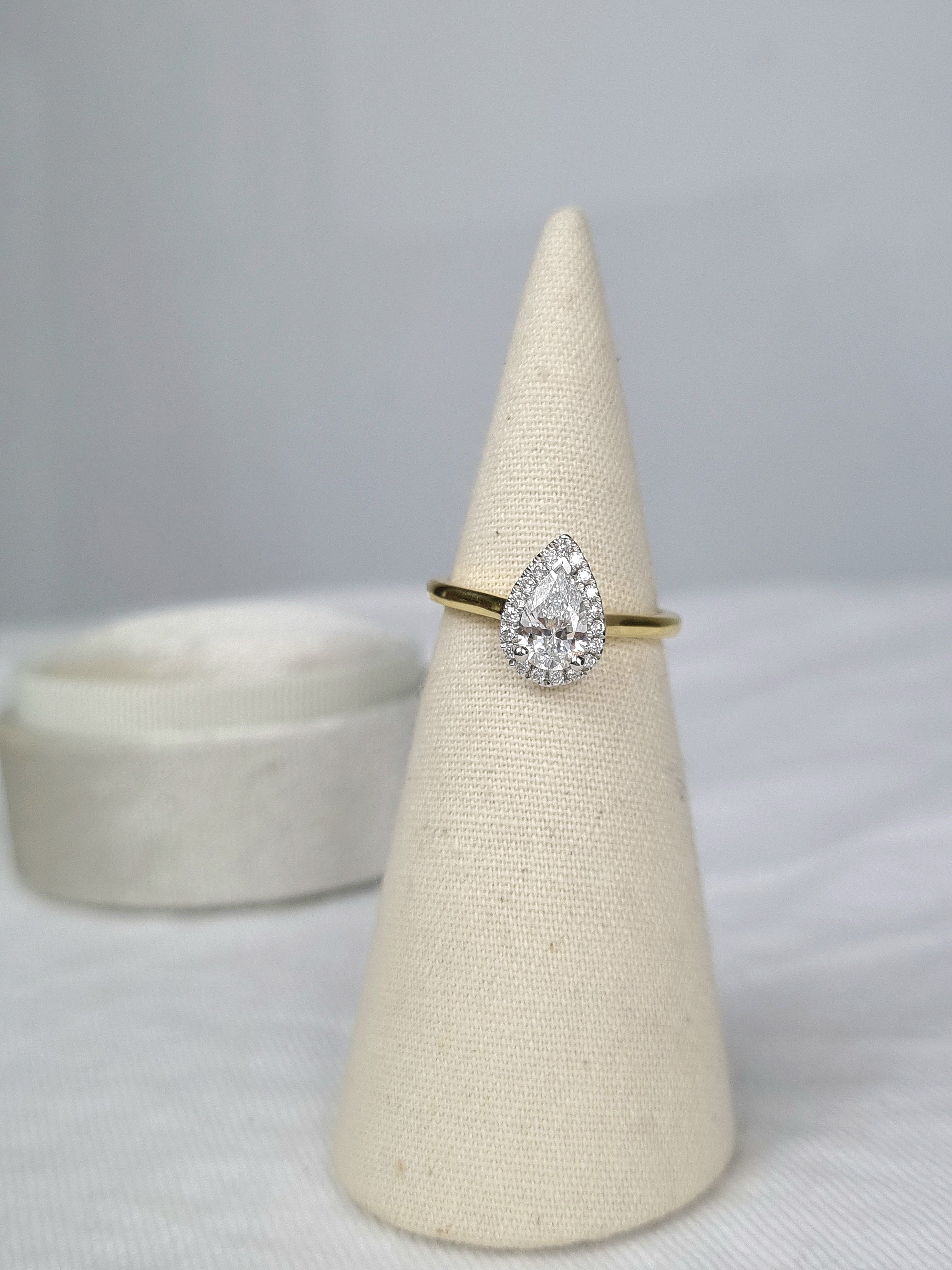 18ct Yellow and White Gold Pear Cut Diamond Ring, 0.70ct Centre
