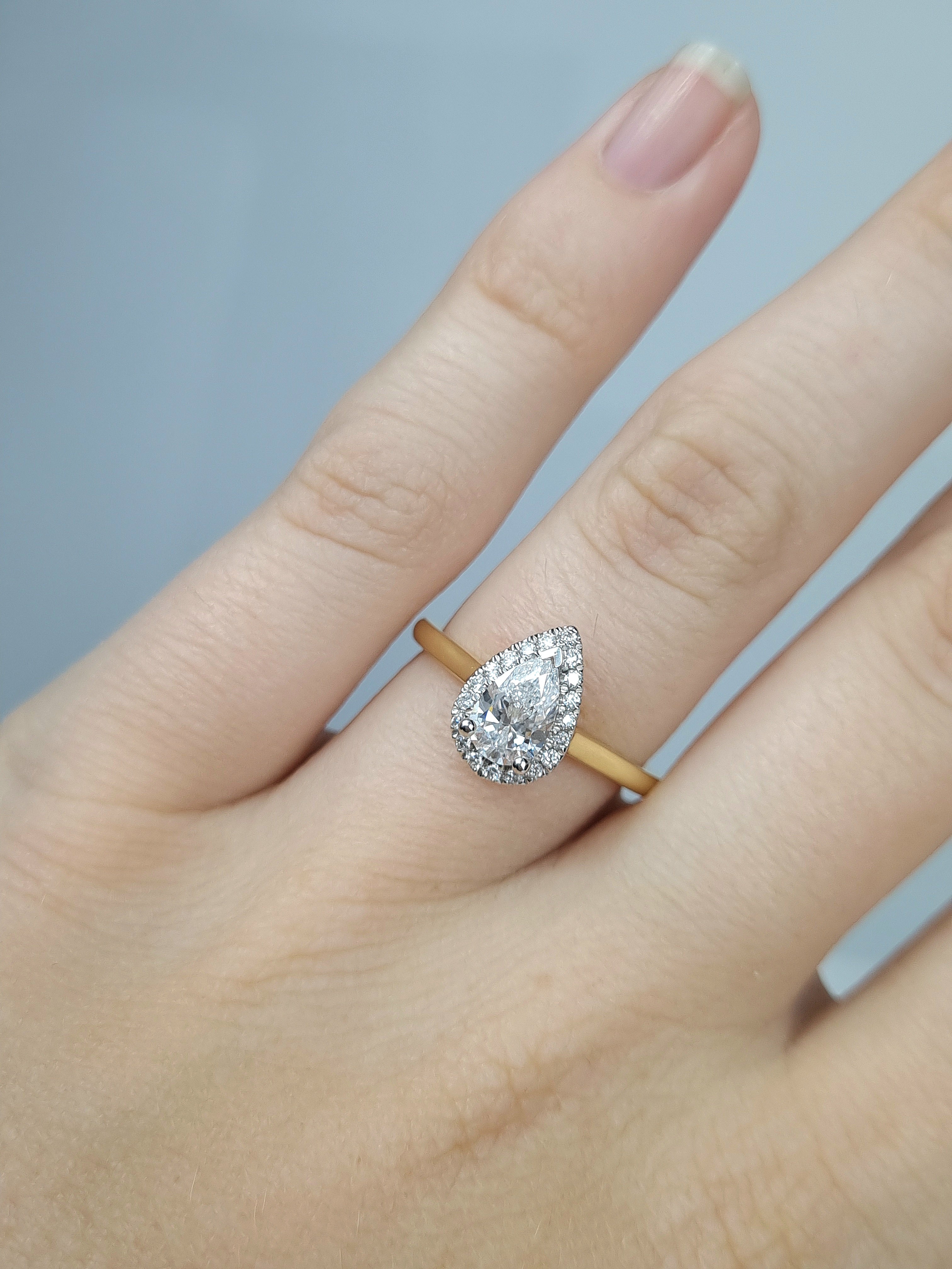 18ct Yellow and White Gold Pear Cut Diamond Ring, 0.70ct Centre