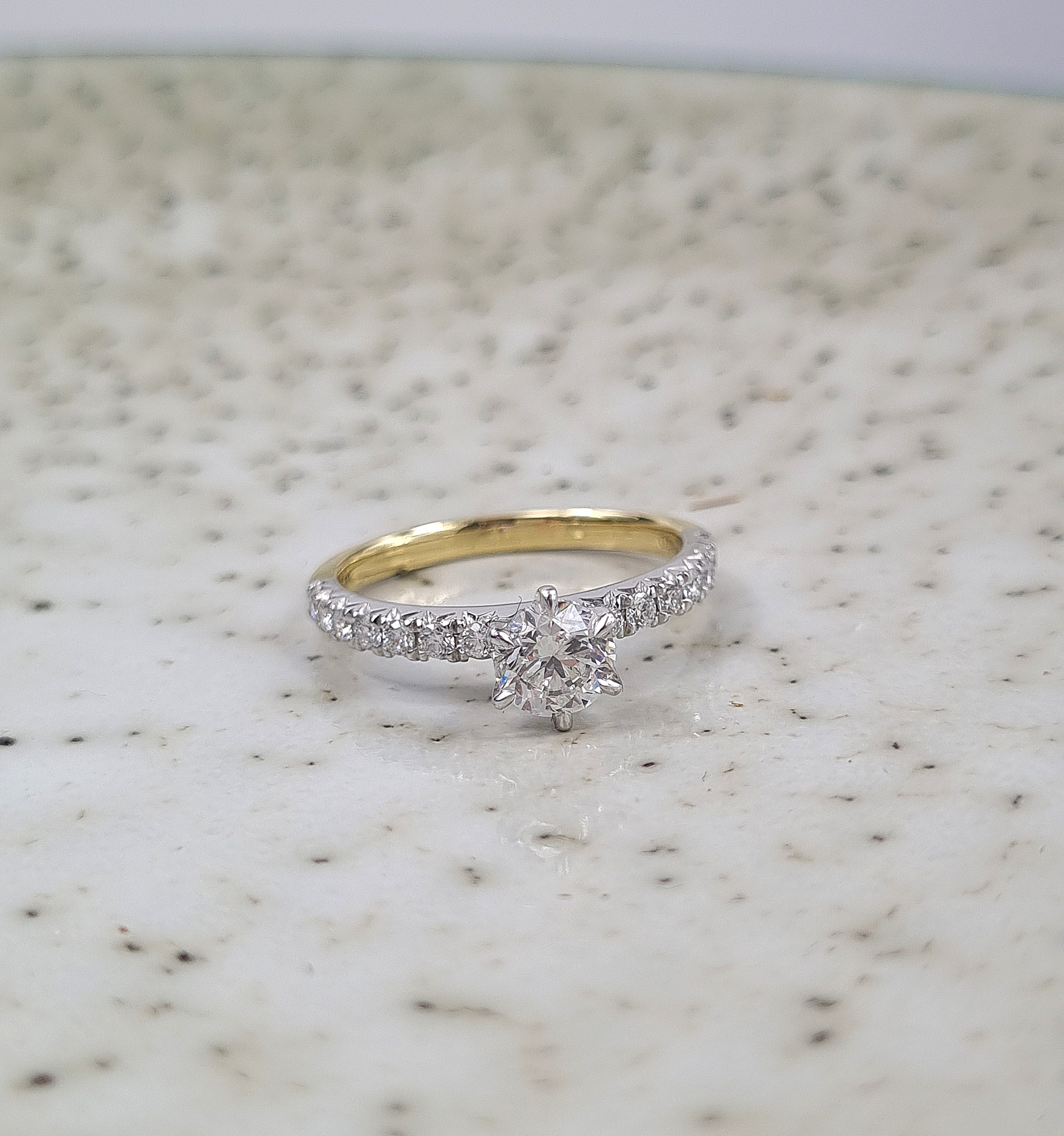 18ct Yellow and White Gold Round Brillant Cut Diamond Engagement Ring, 0.70ct Centre
