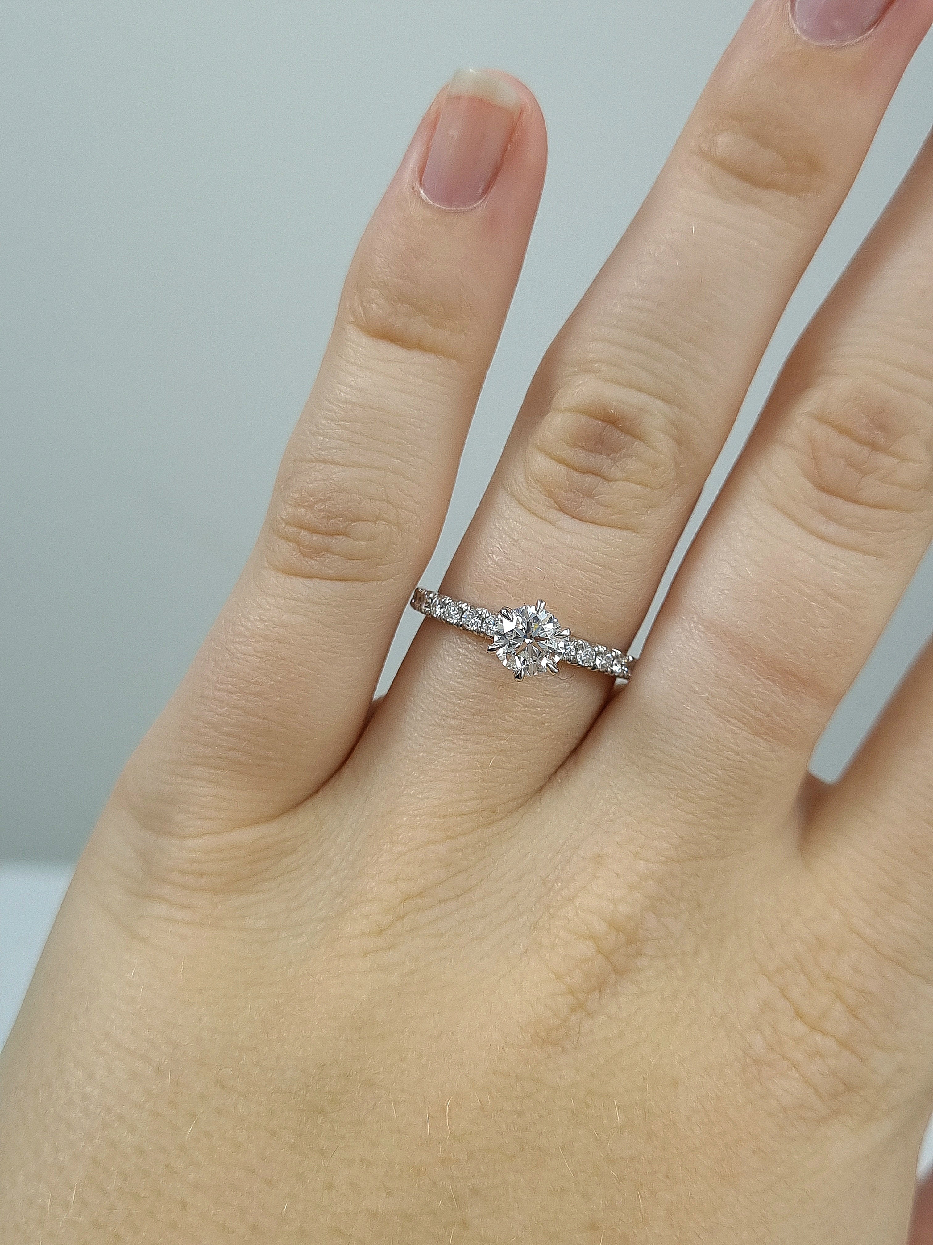18ct Yellow and White Gold Round Brillant Cut Diamond Engagement Ring, 0.70ct Centre