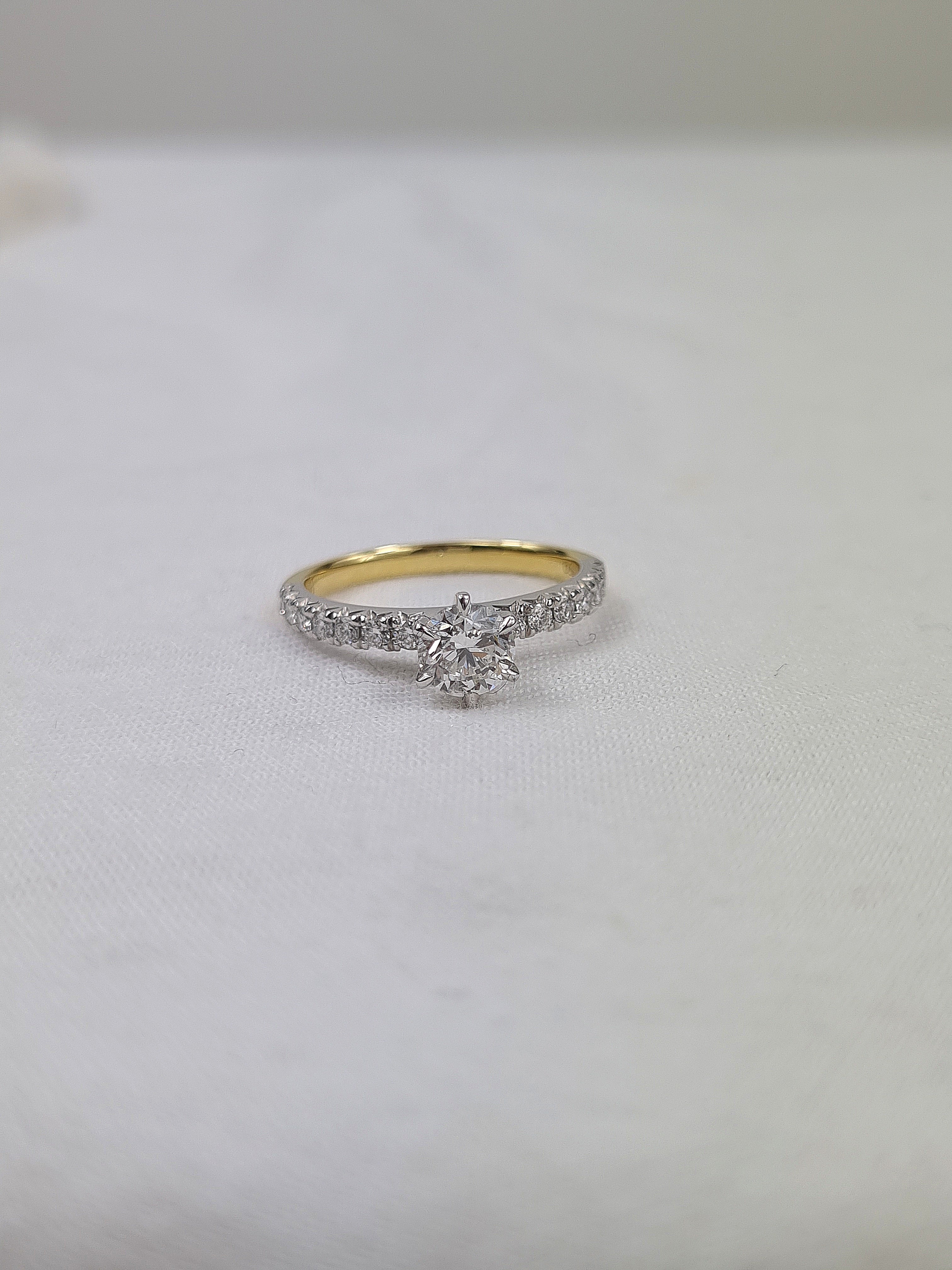 18ct Yellow and White Gold Round Brillant Cut Diamond Engagement Ring, 0.70ct Centre