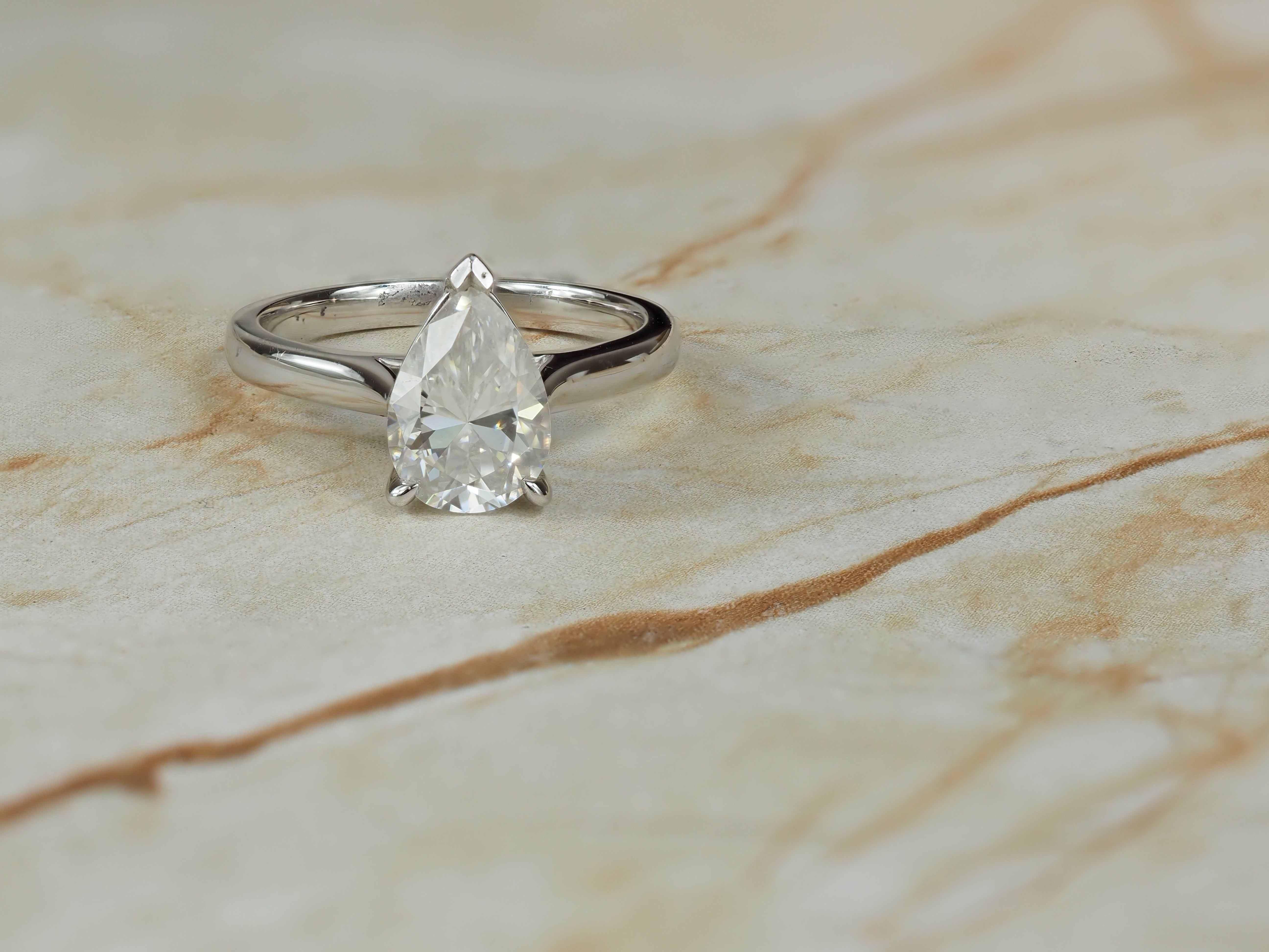 9ct White Gold Moissanite Pear Solitaire.