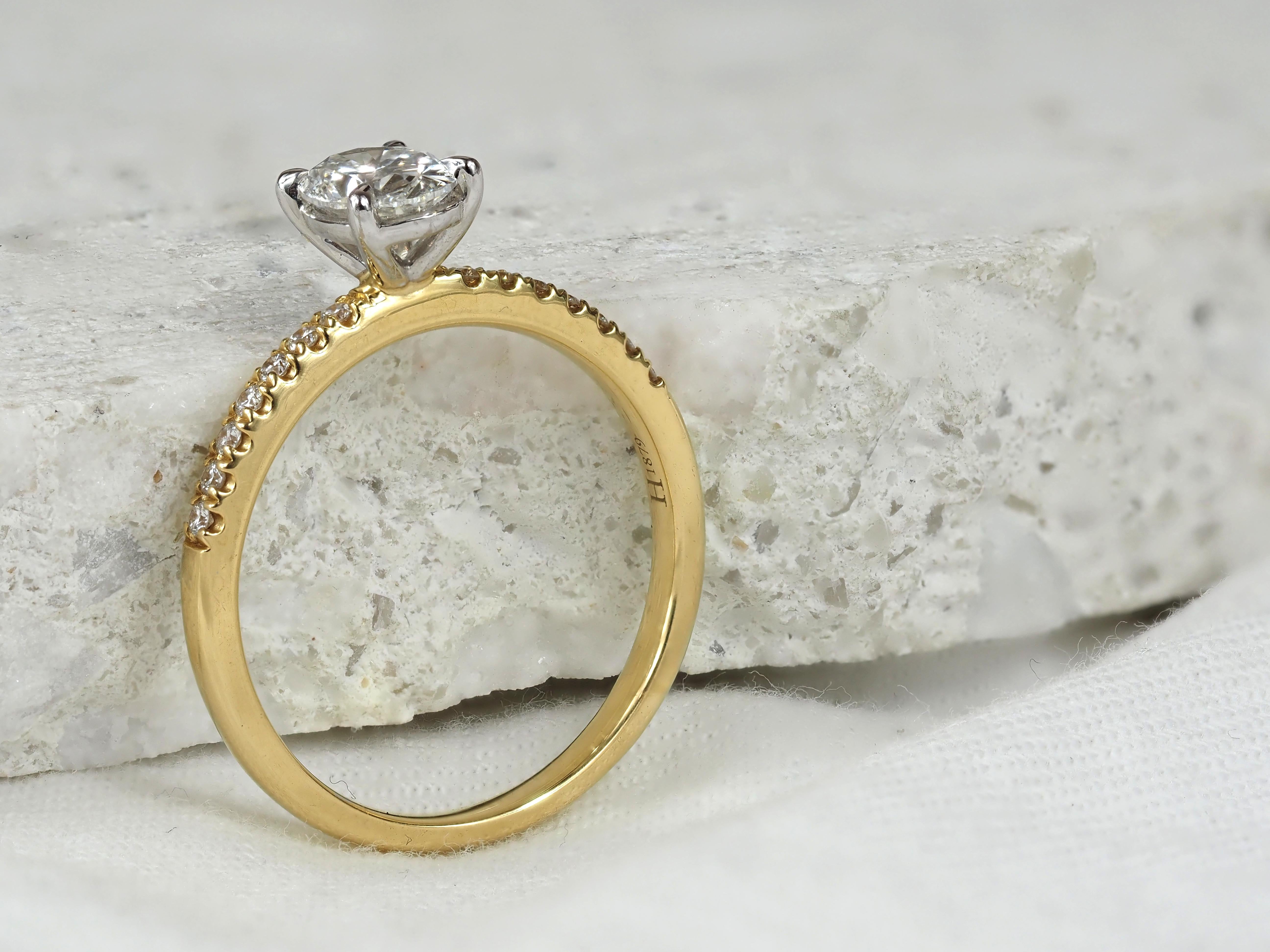 18ct Yellow and White gold Oval Cut Diamond Engagement Ring, 0.72ct Centre