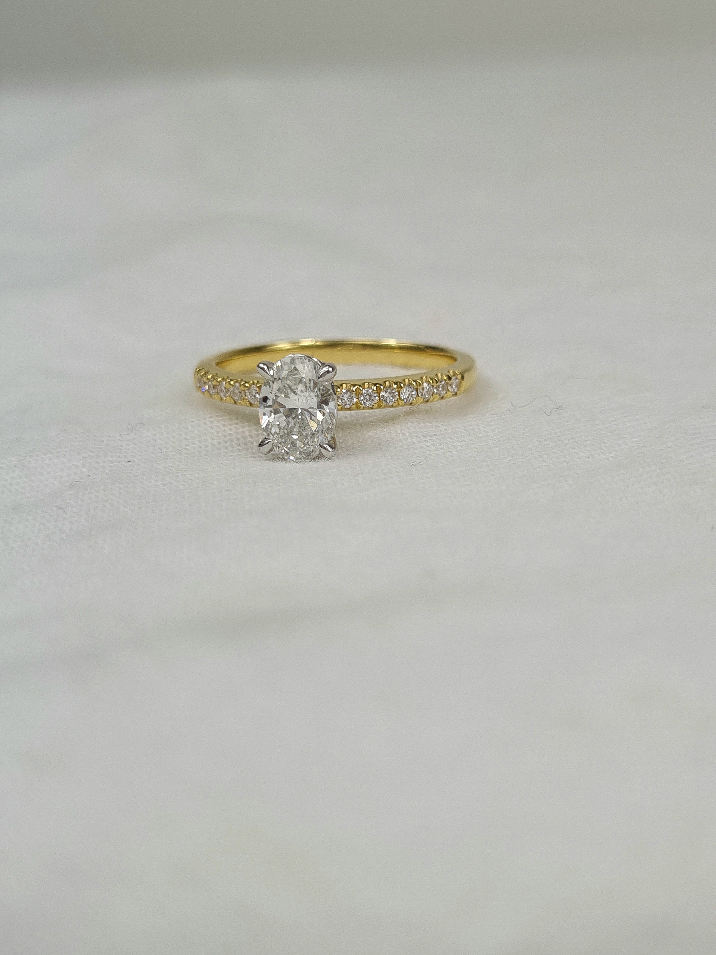 18ct Yellow and White gold Oval Cut Diamond Engagement Ring, 0.72ct Centre