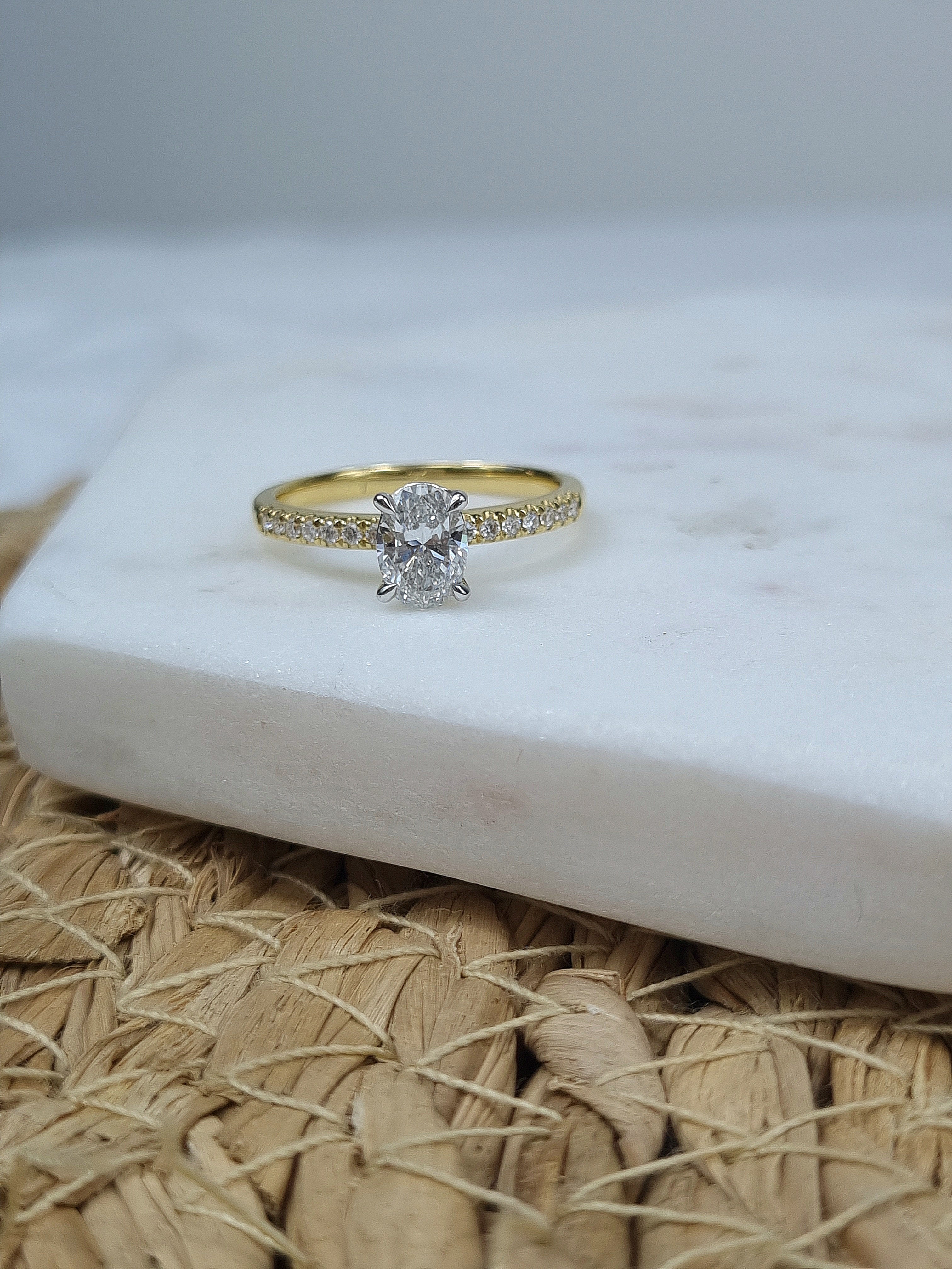 18ct Yellow and White gold Oval Cut Diamond Engagement Ring, 0.72ct Centre