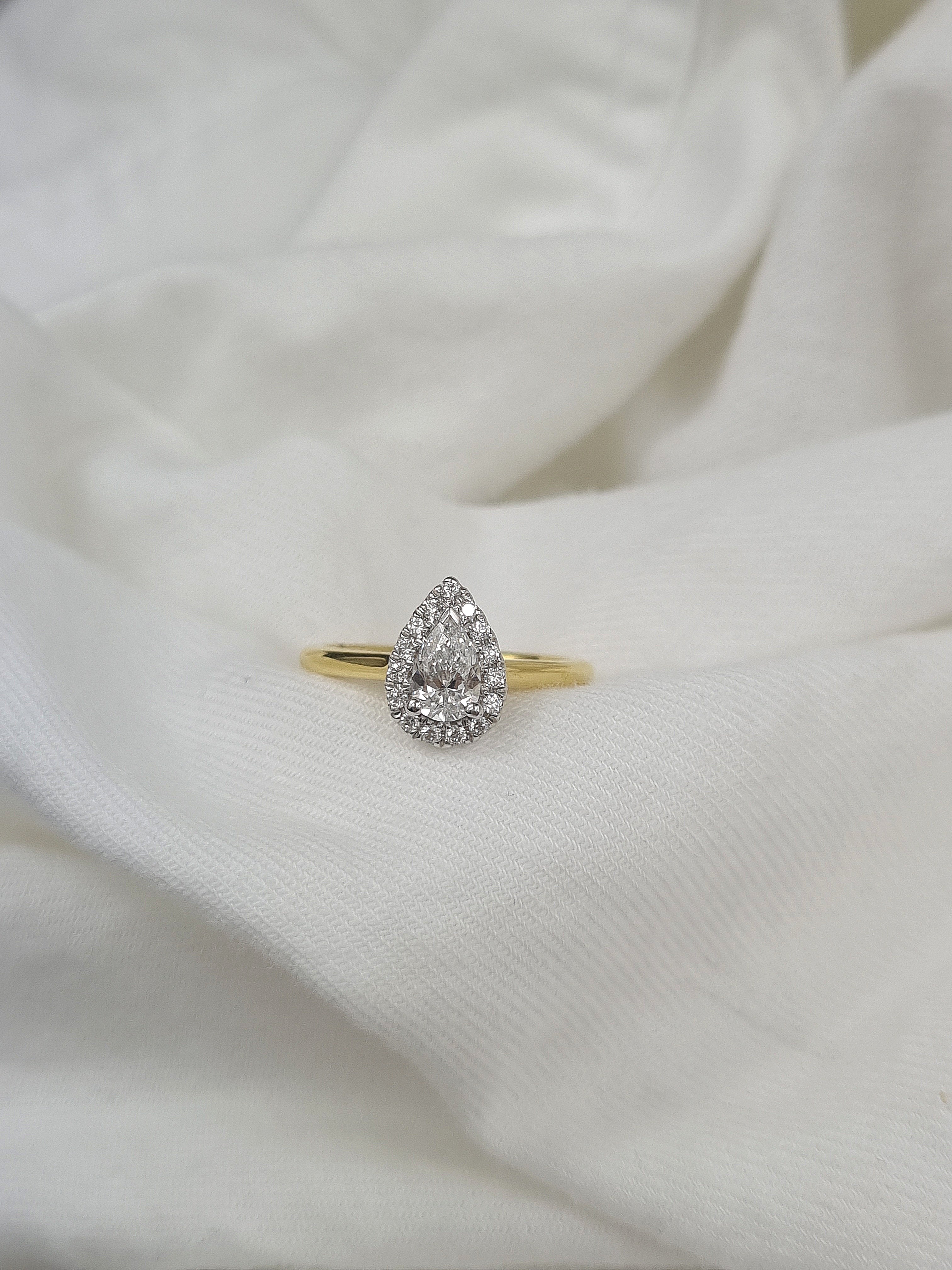 18ct Yellow and White gold, Pear cut Diamond engagement ring, 0.50 carat centre
