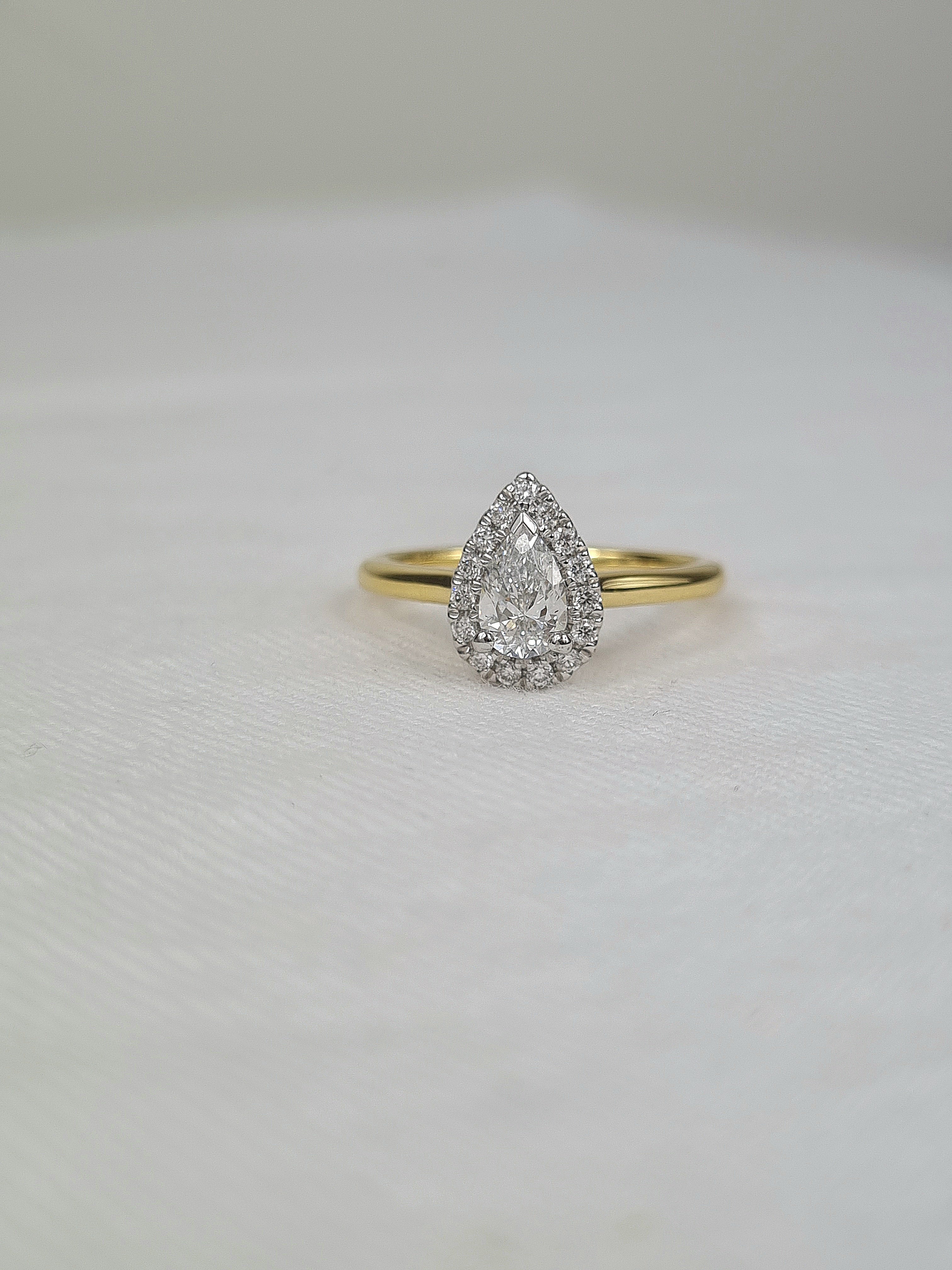 18ct Yellow and White gold, Pear cut Diamond engagement ring, 0.50 carat centre