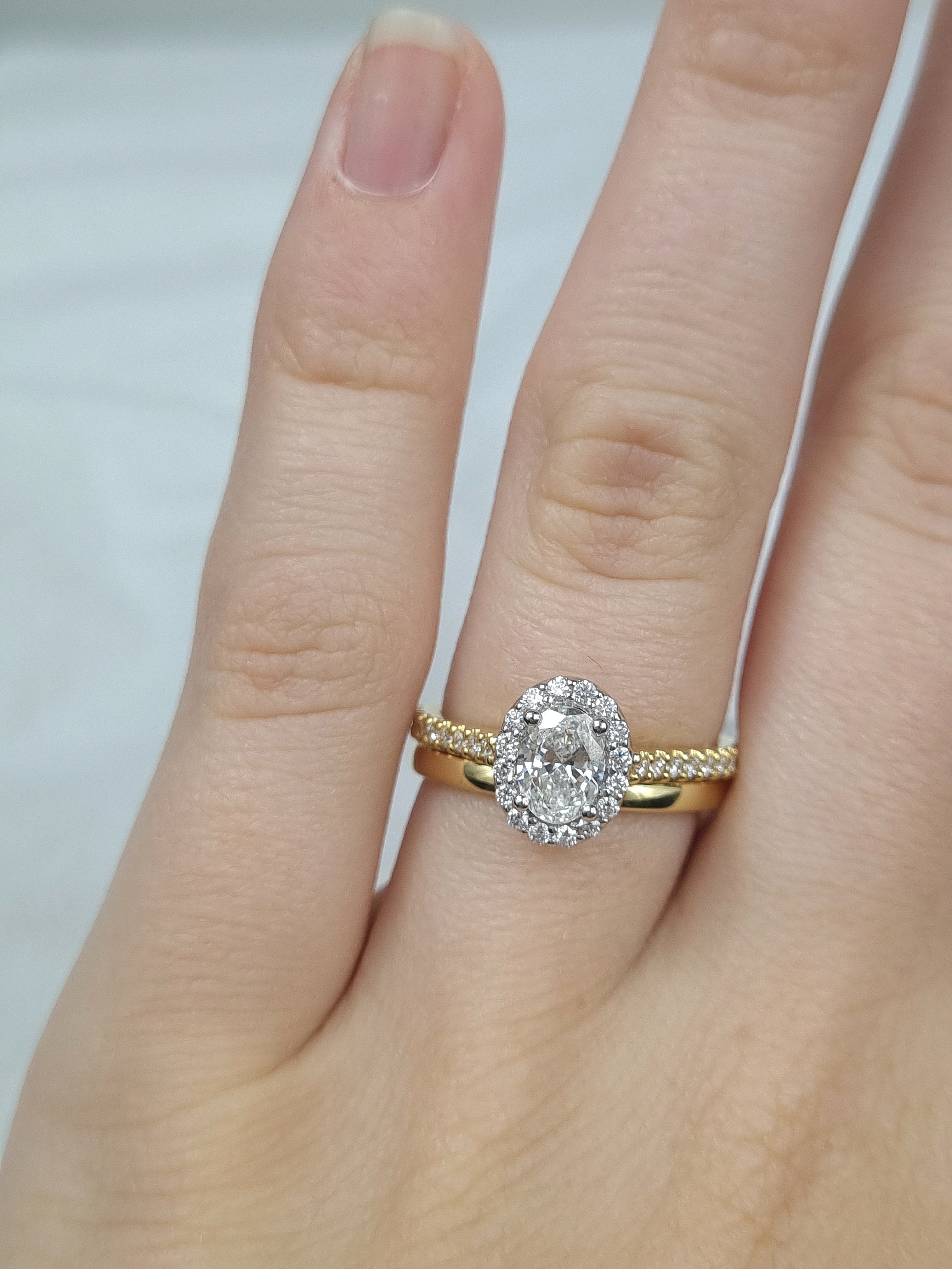 18ct Yellow and White Gold Oval Halo Engagement Ring, 0.56ct centre