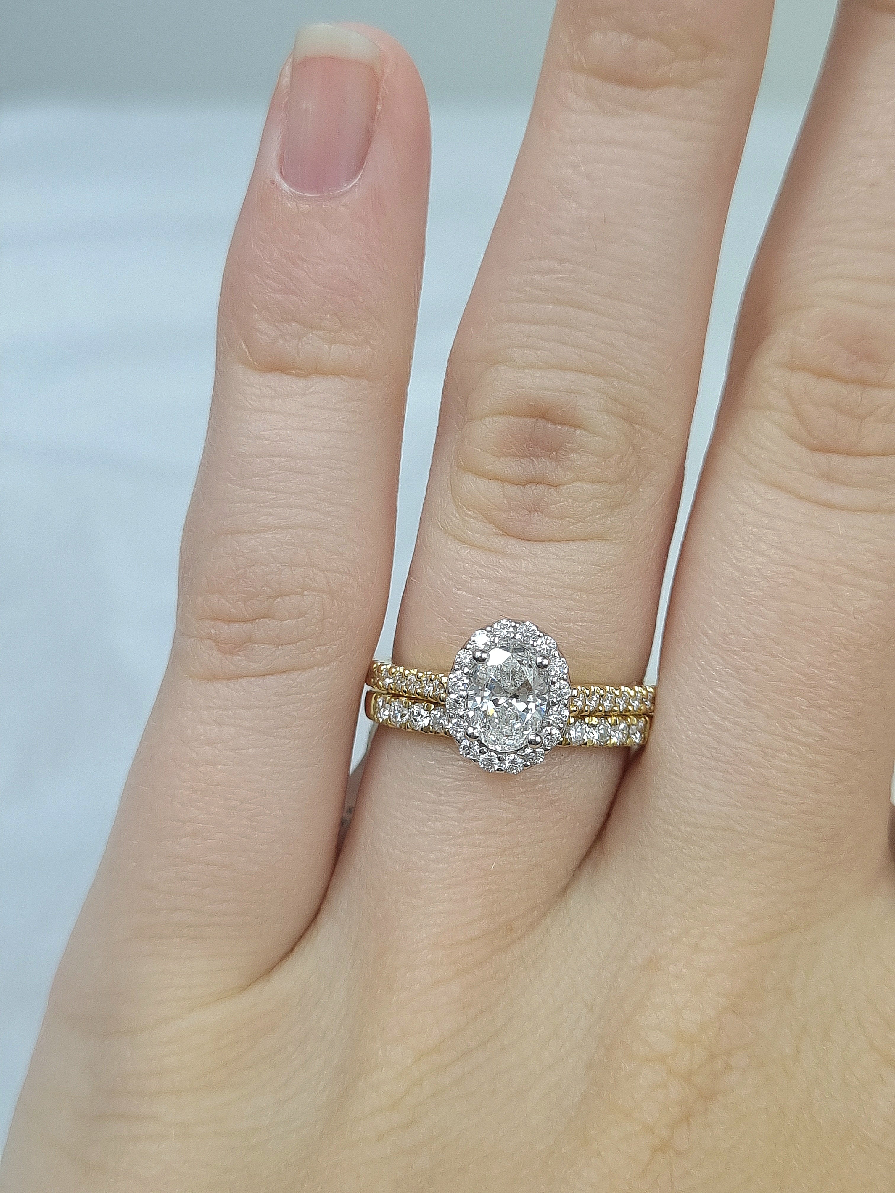 18ct Yellow and White Gold Oval Halo Engagement Ring, 0.56ct centre