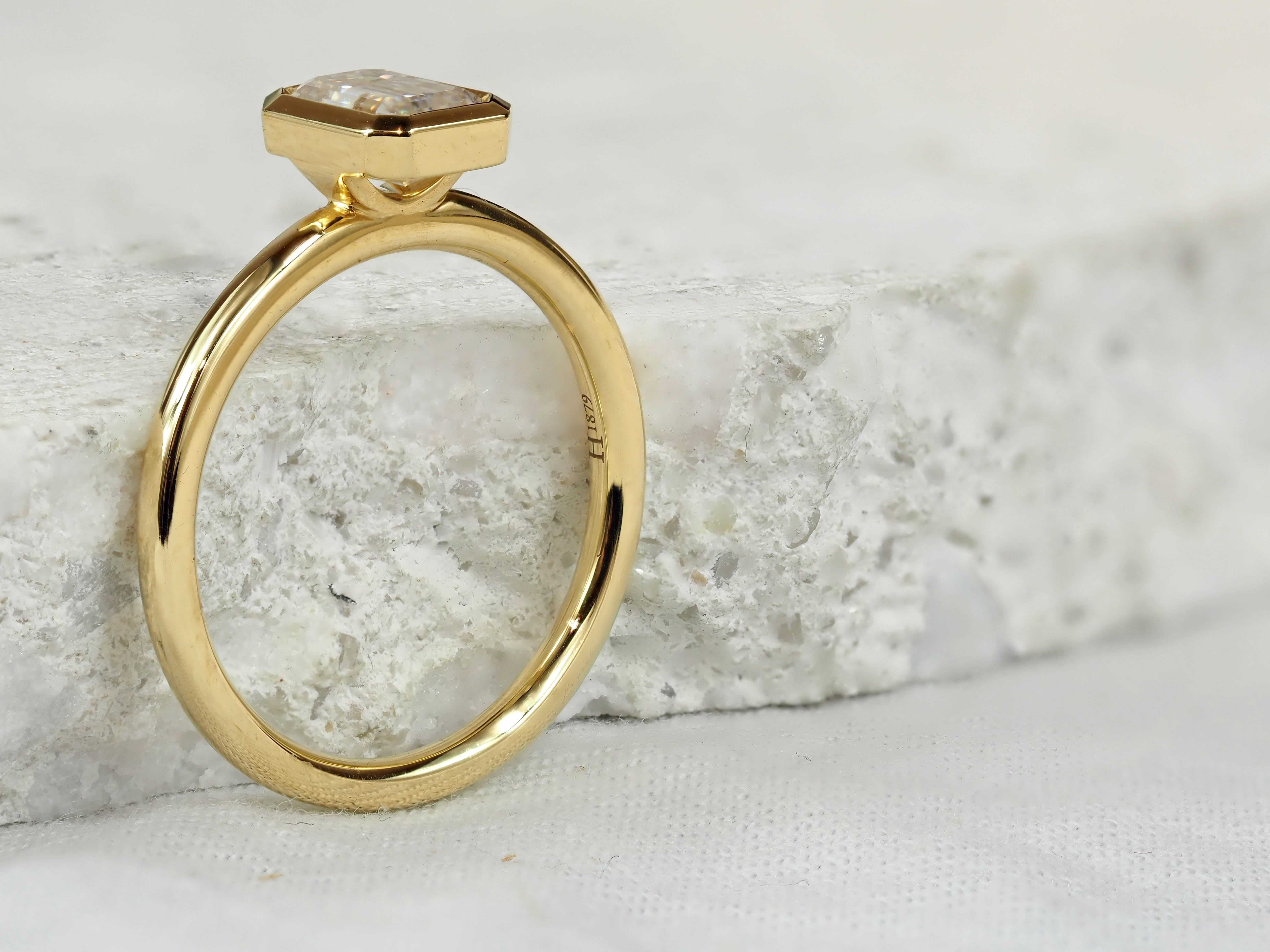 18ct Yellow Gold Emerald Cut Moissanite Solitaire.