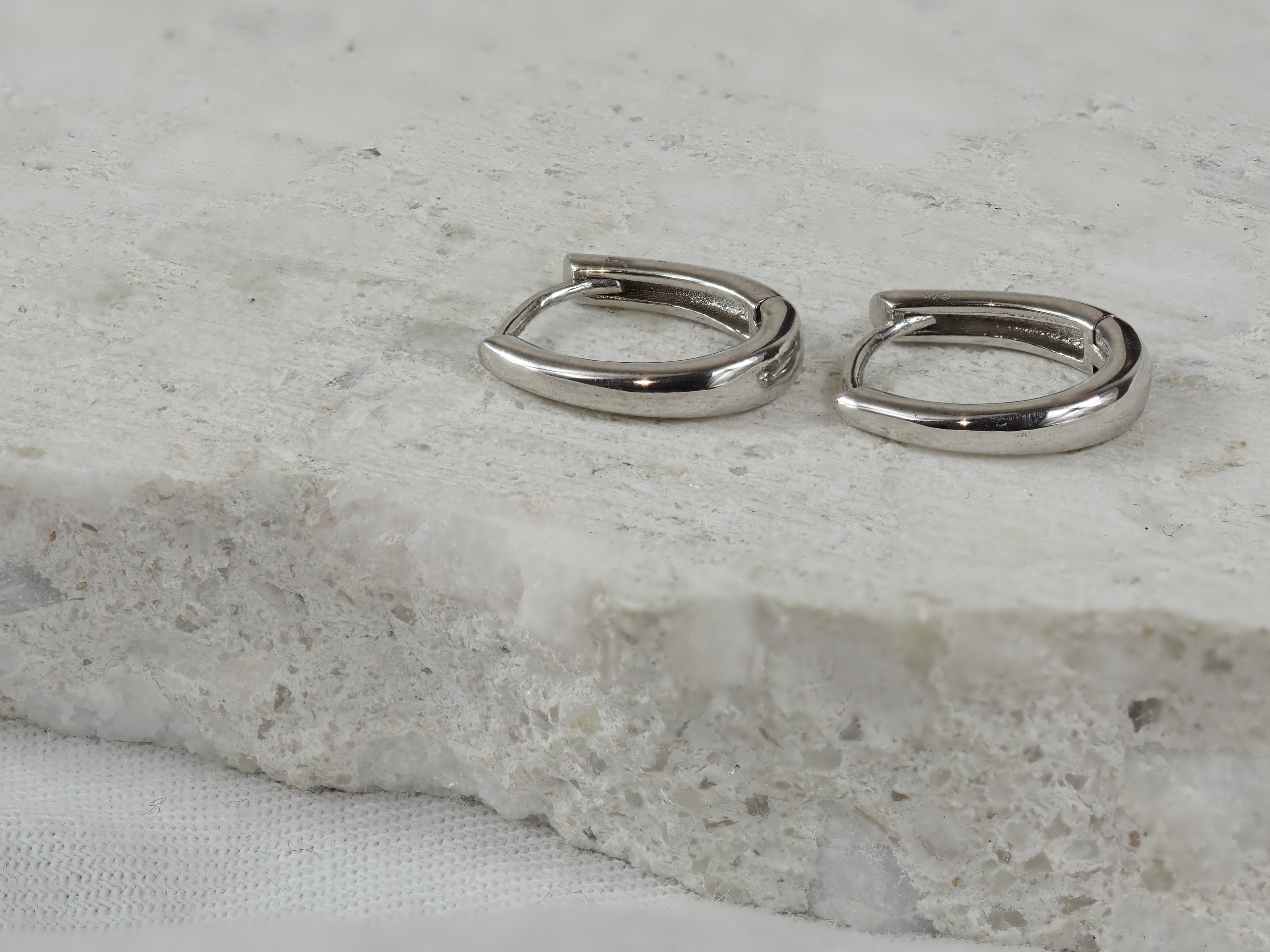9ct White Gold Oval Huggie Earrings