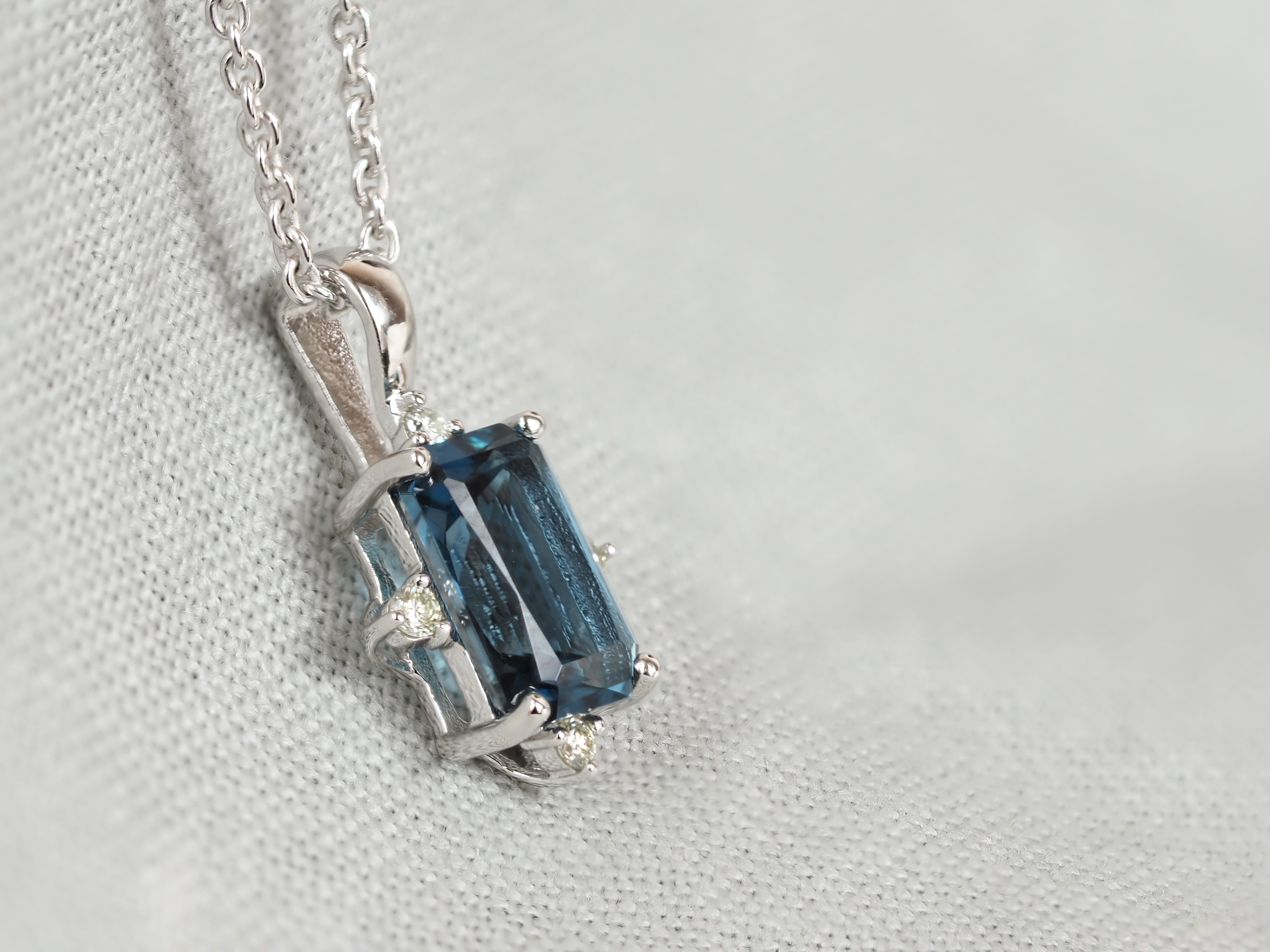 9ct White Gold London Blue Topaz and Diamond Pendant