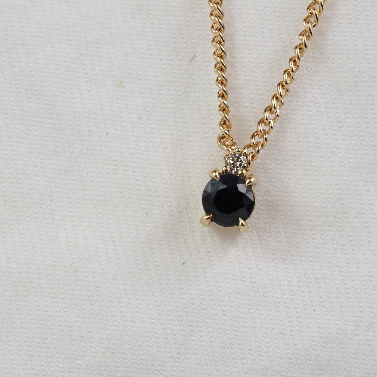 9ct Yellow Gold Sapphire and Diamond pendant, 0.69ct centre