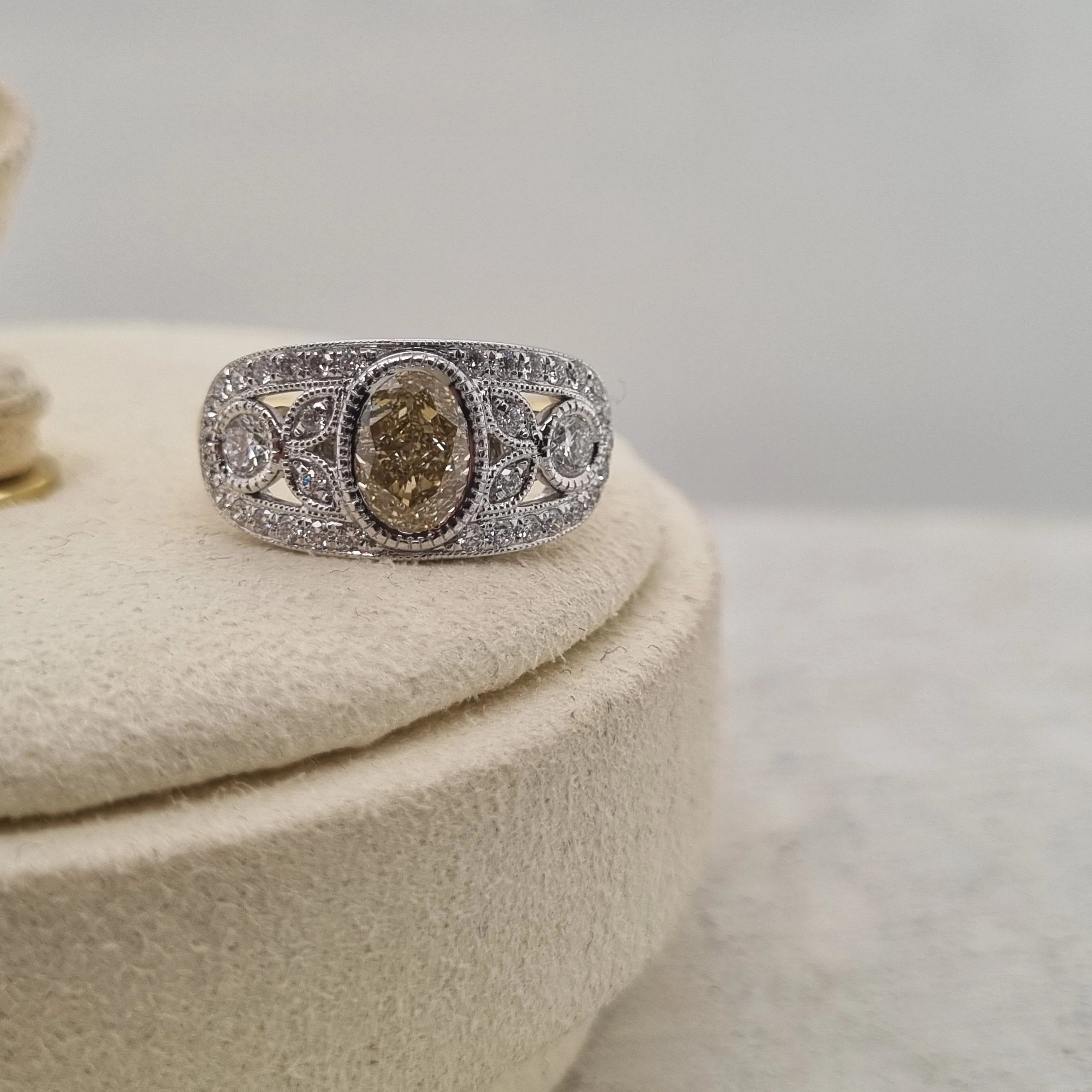 18ct Gold Natural Yellow Oval Diamond Ring, 1.15 carat centre.