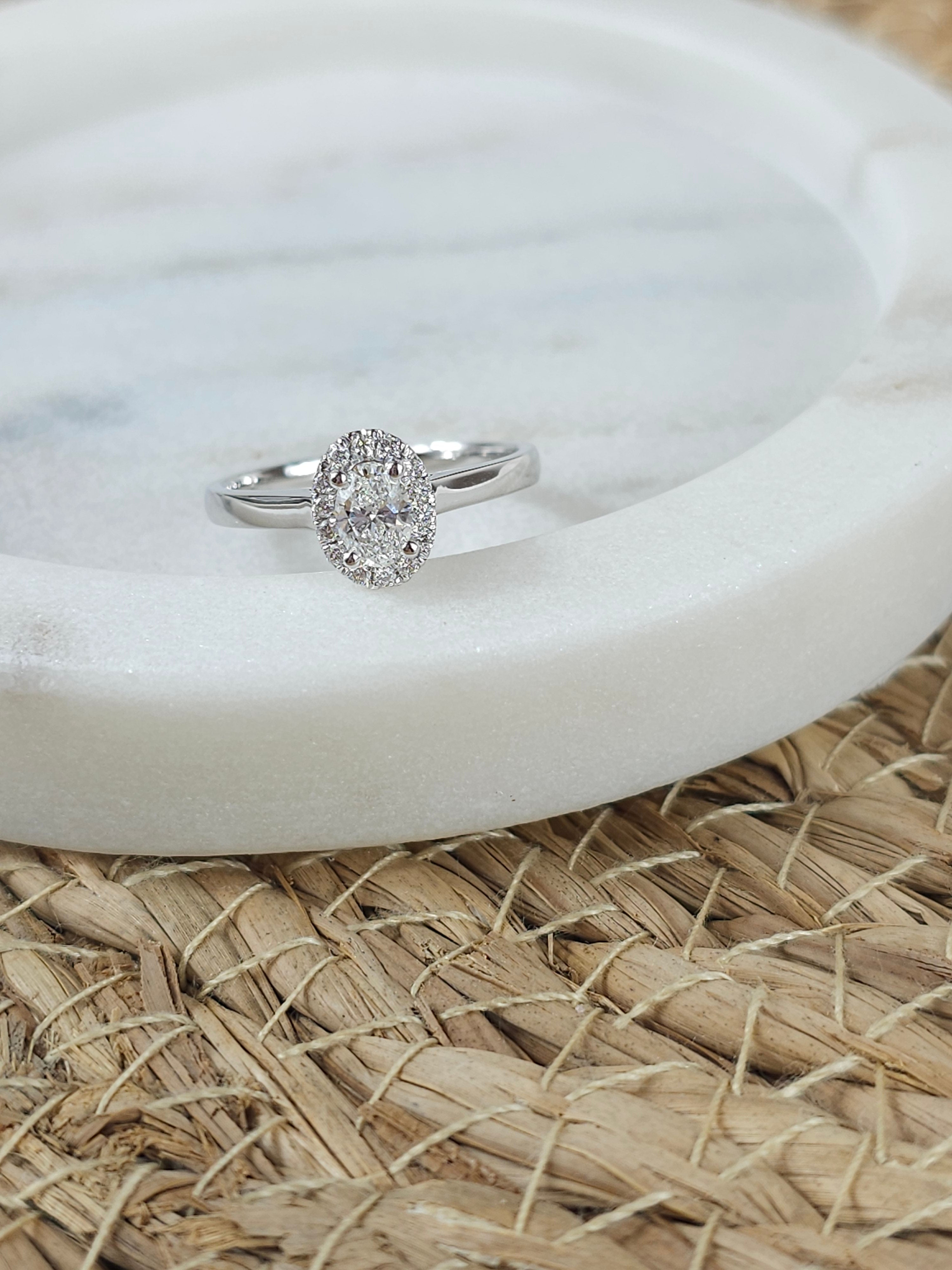 18ct White Gold Oval Cut Diamond Halo Engagement ring, 0.40ct centre
