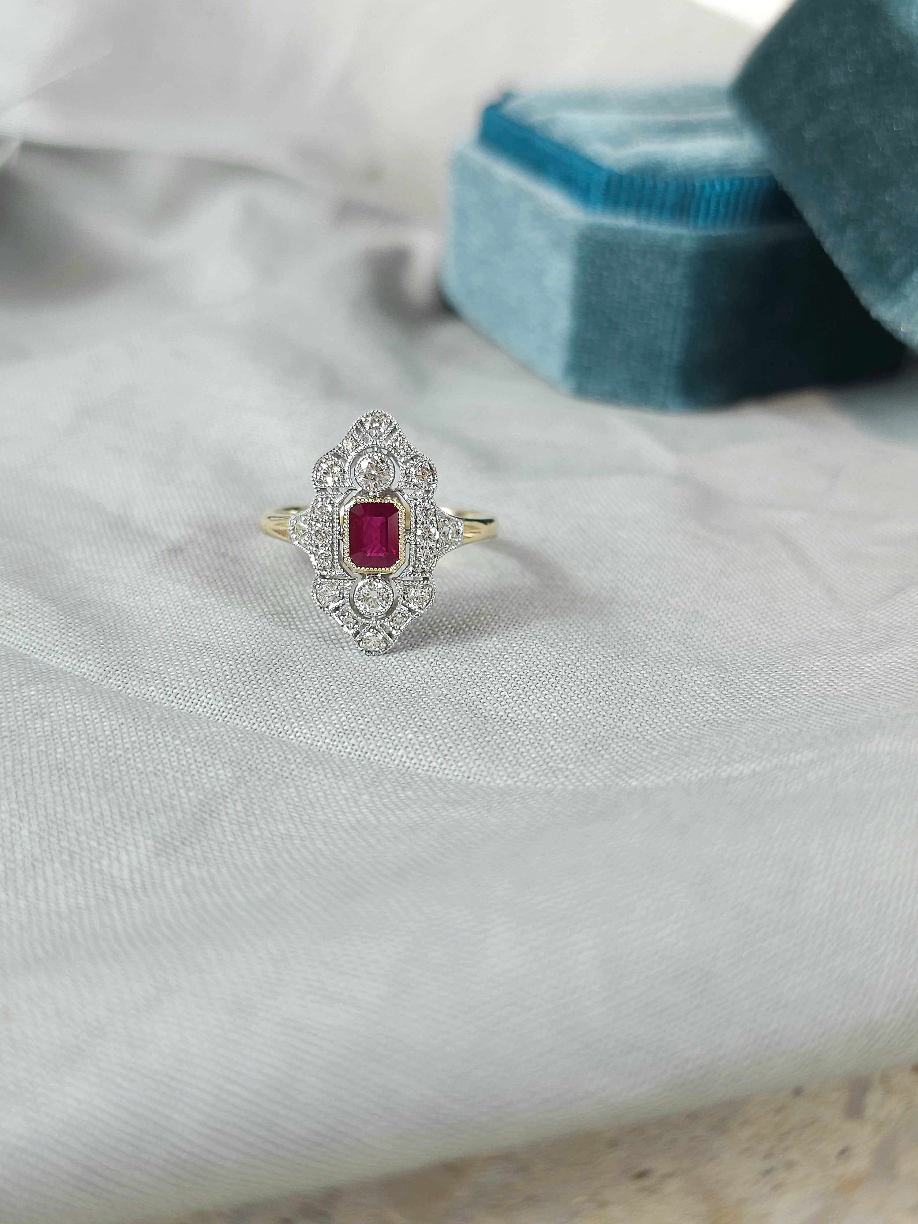 9ct Yellow and White Gold Ruby and Diamond ring, 0.54ct centre