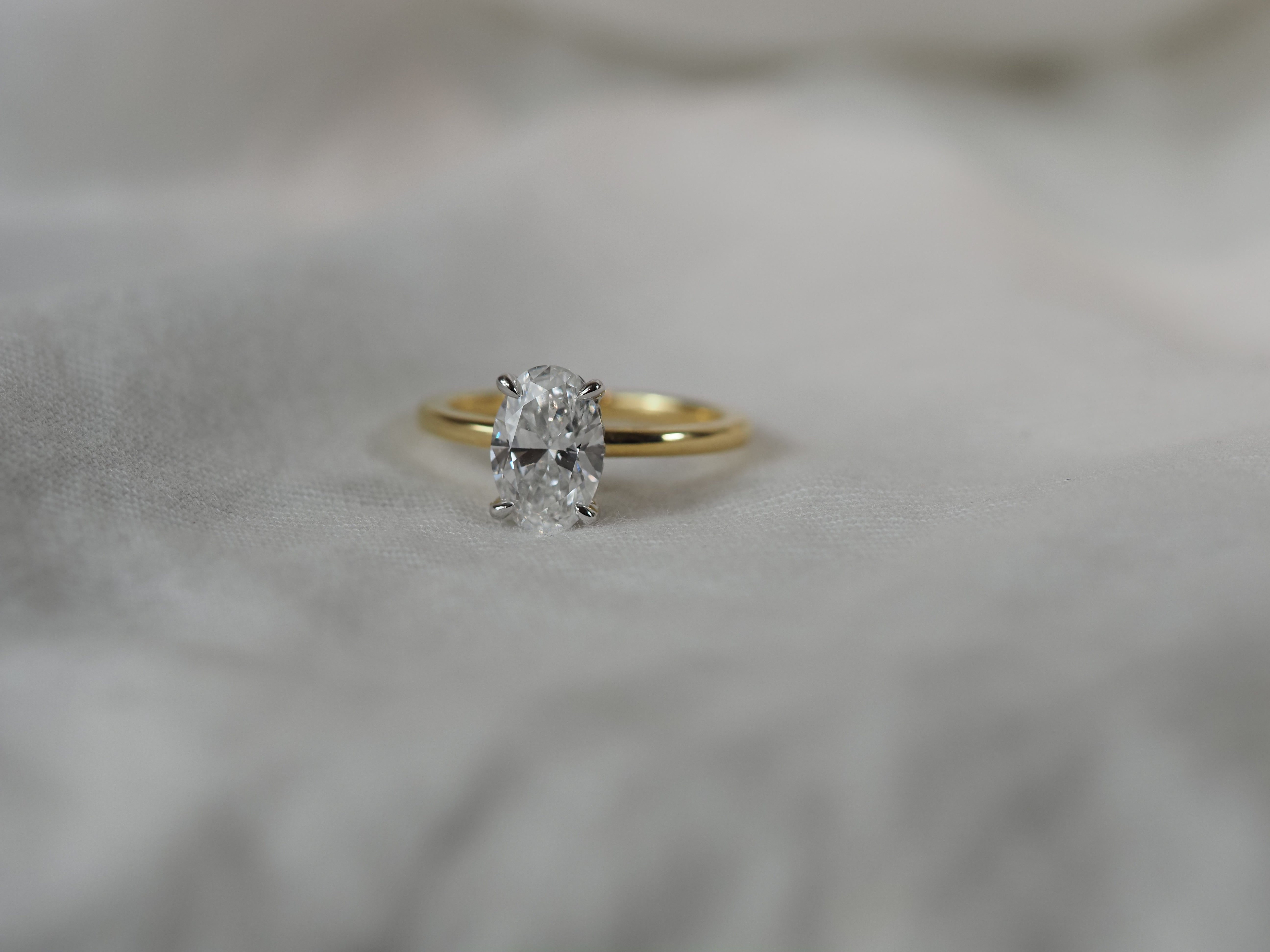 18ct Yellow and White Gold Lab-Grown Oval cut Diamond Engagement ring, 1.76ct Centre
