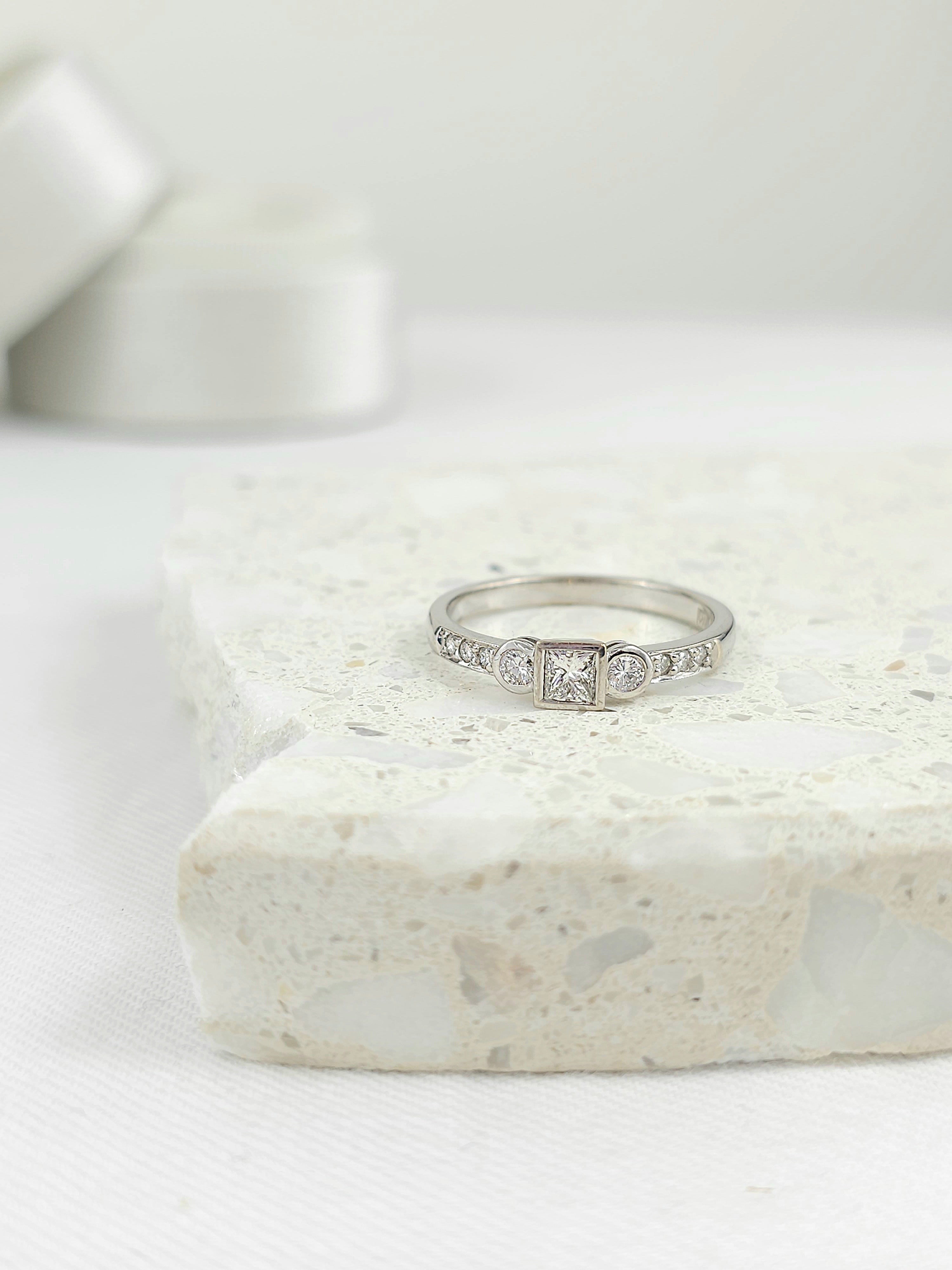 18ct White Gold Princess and Round Brillant cut Diamond engagement ring