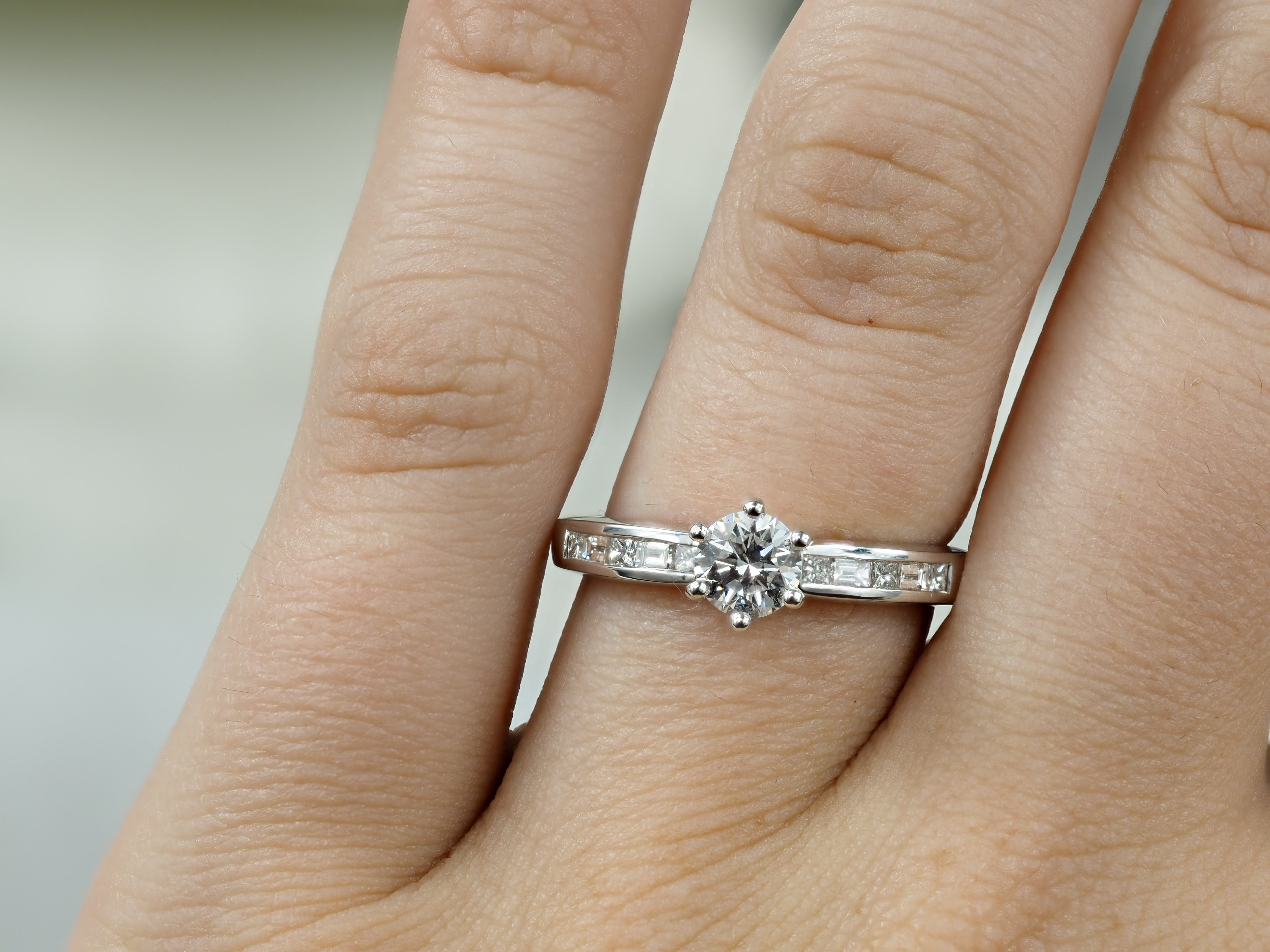 18ct White Gold Round Brilliant, Princess and Baguette Cut Diamond Engagement Ring, 0.54ct Centre