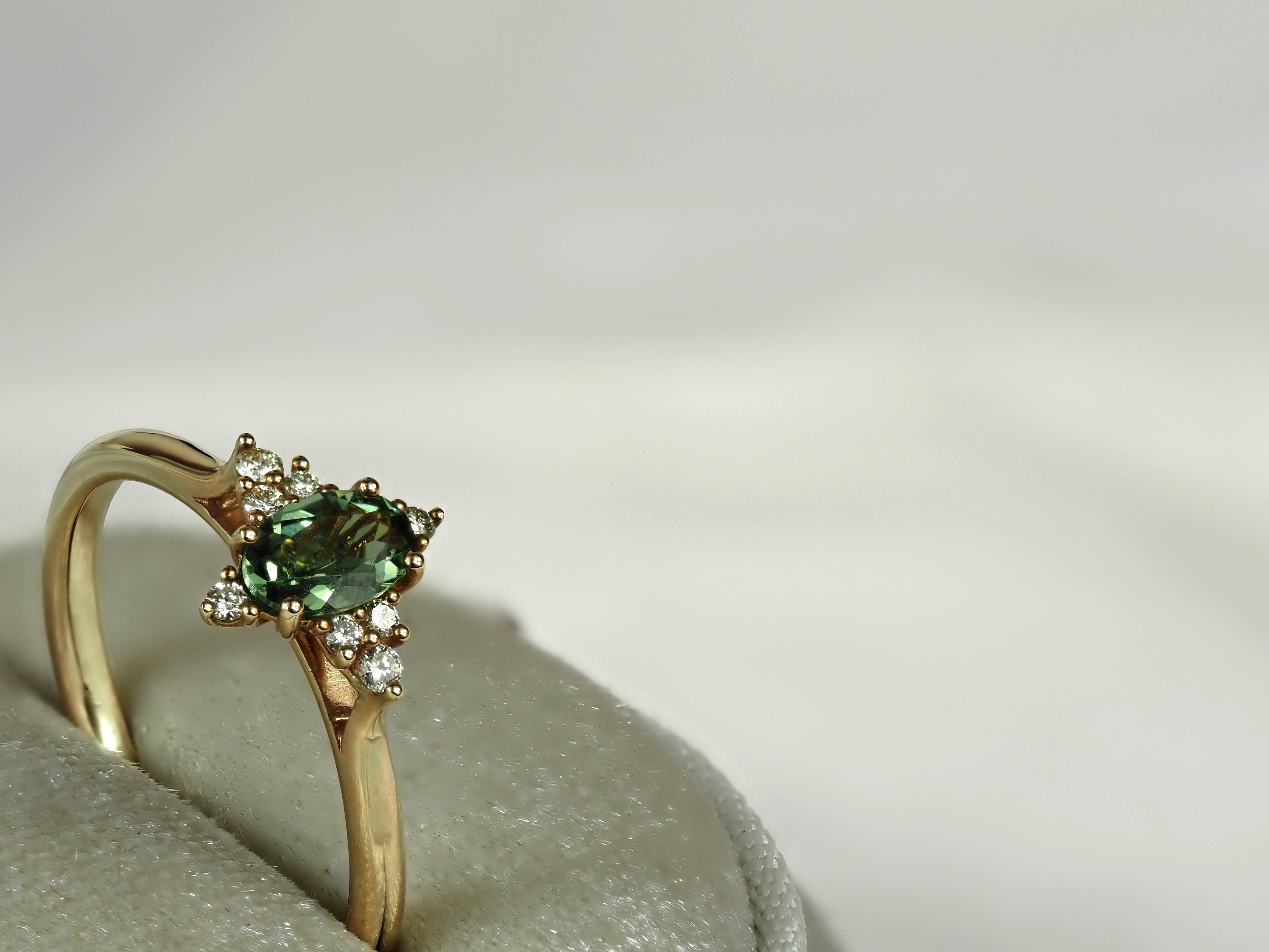 9ct Yellow Gold Mint Tourmaline and Diamond ring, 0.38ct centre