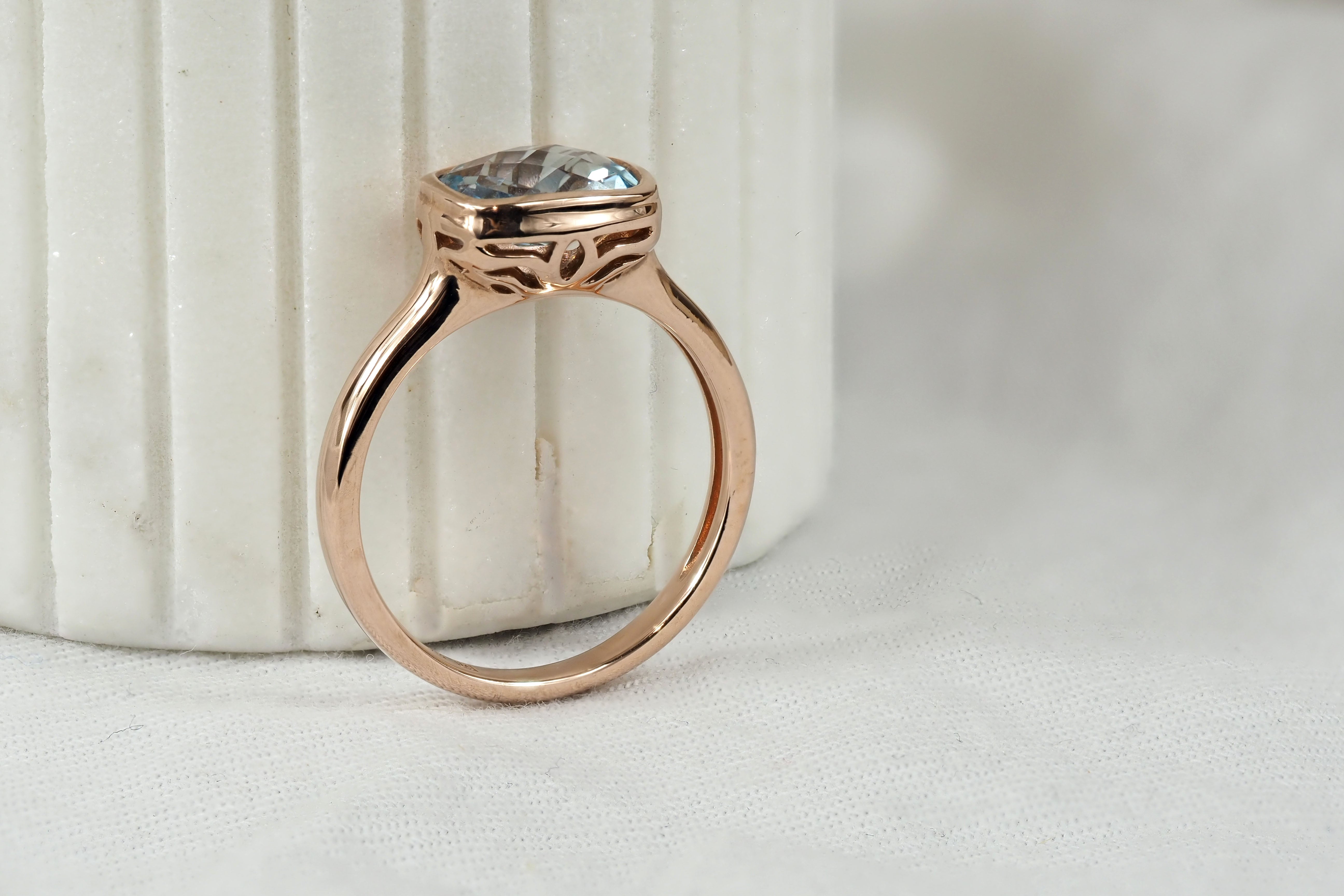 9ct Rose Gold & Blue Topaz ring