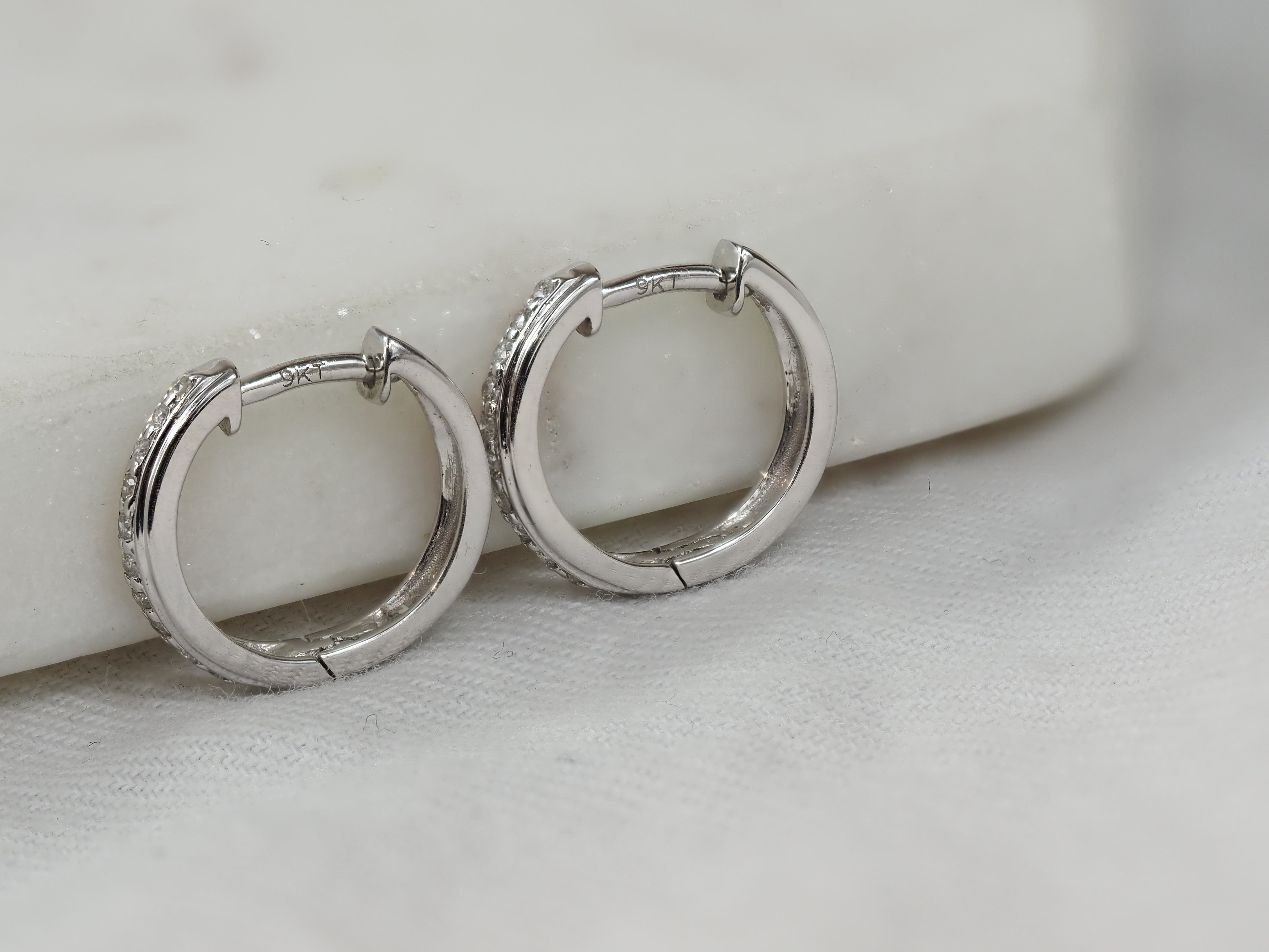 9ct White Gold Diamond Huggie Earrings, 0.10ct total