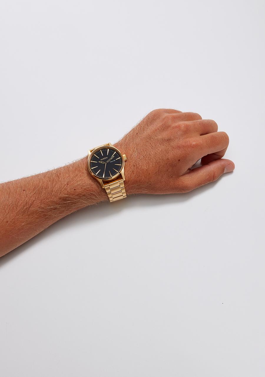 Nixon Sentry Gold and Black watch