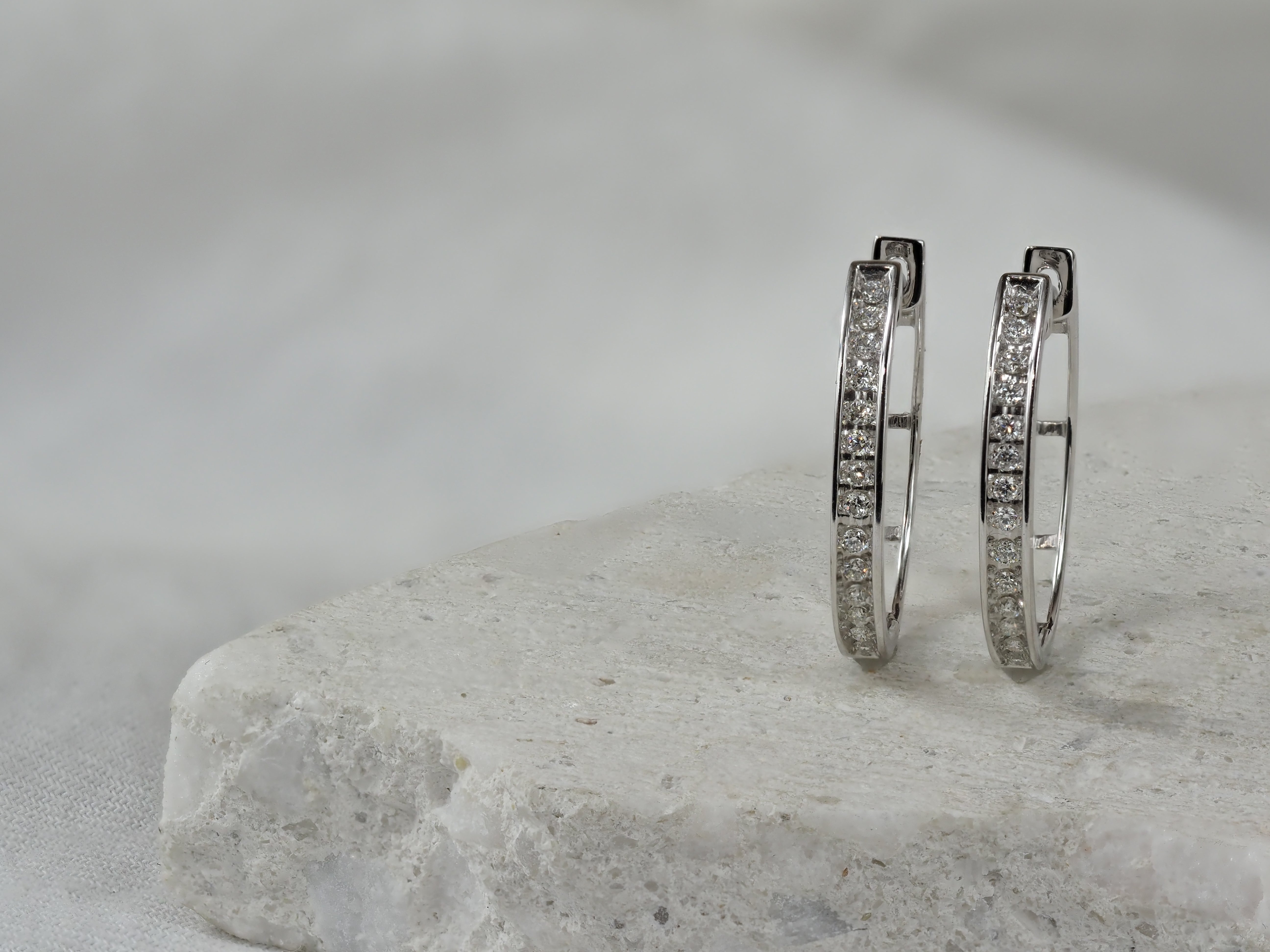 9ct White Gold 0.25ct Diamond Oval Huggie Earrings