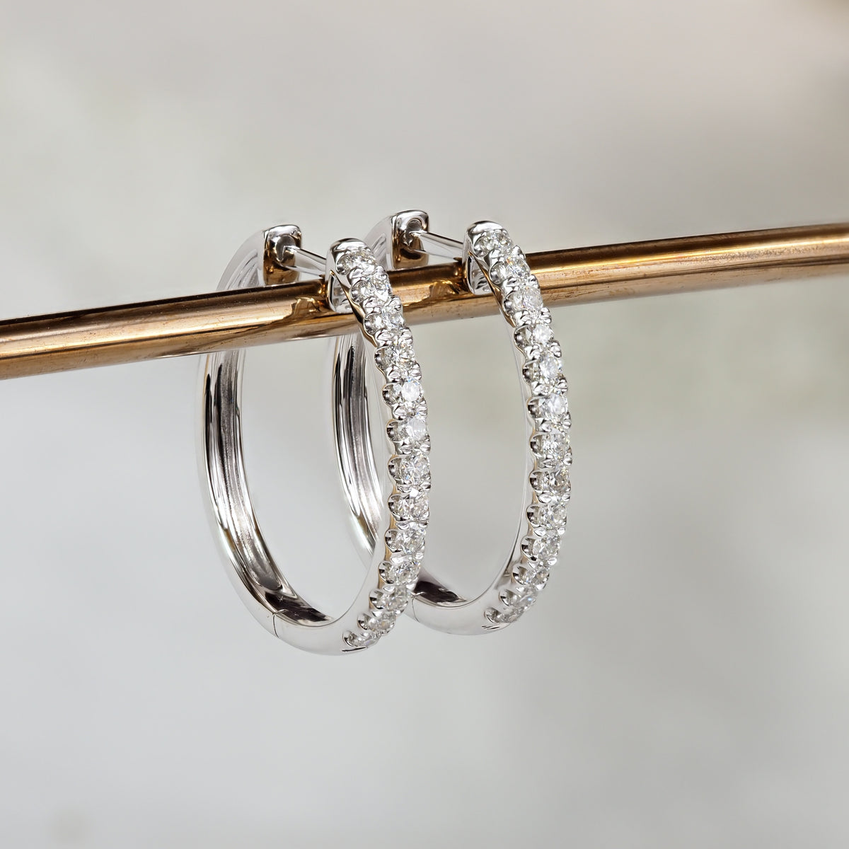 9ct White Gold Diamond Oval Huggie Earrings, 0.26ct Total