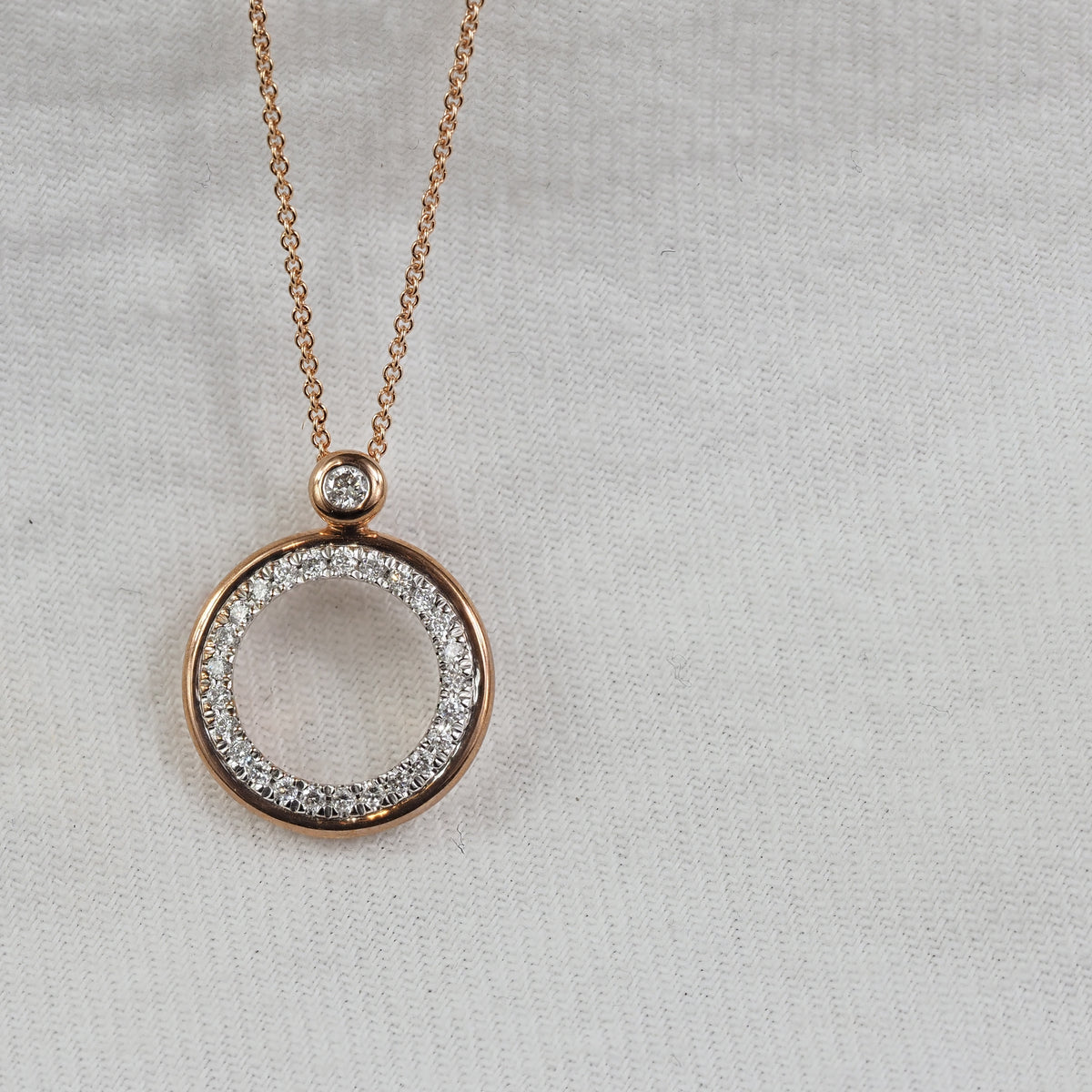 9ct Rose and White Gold Open Circle Diamond Pendant, 0.15ct total
