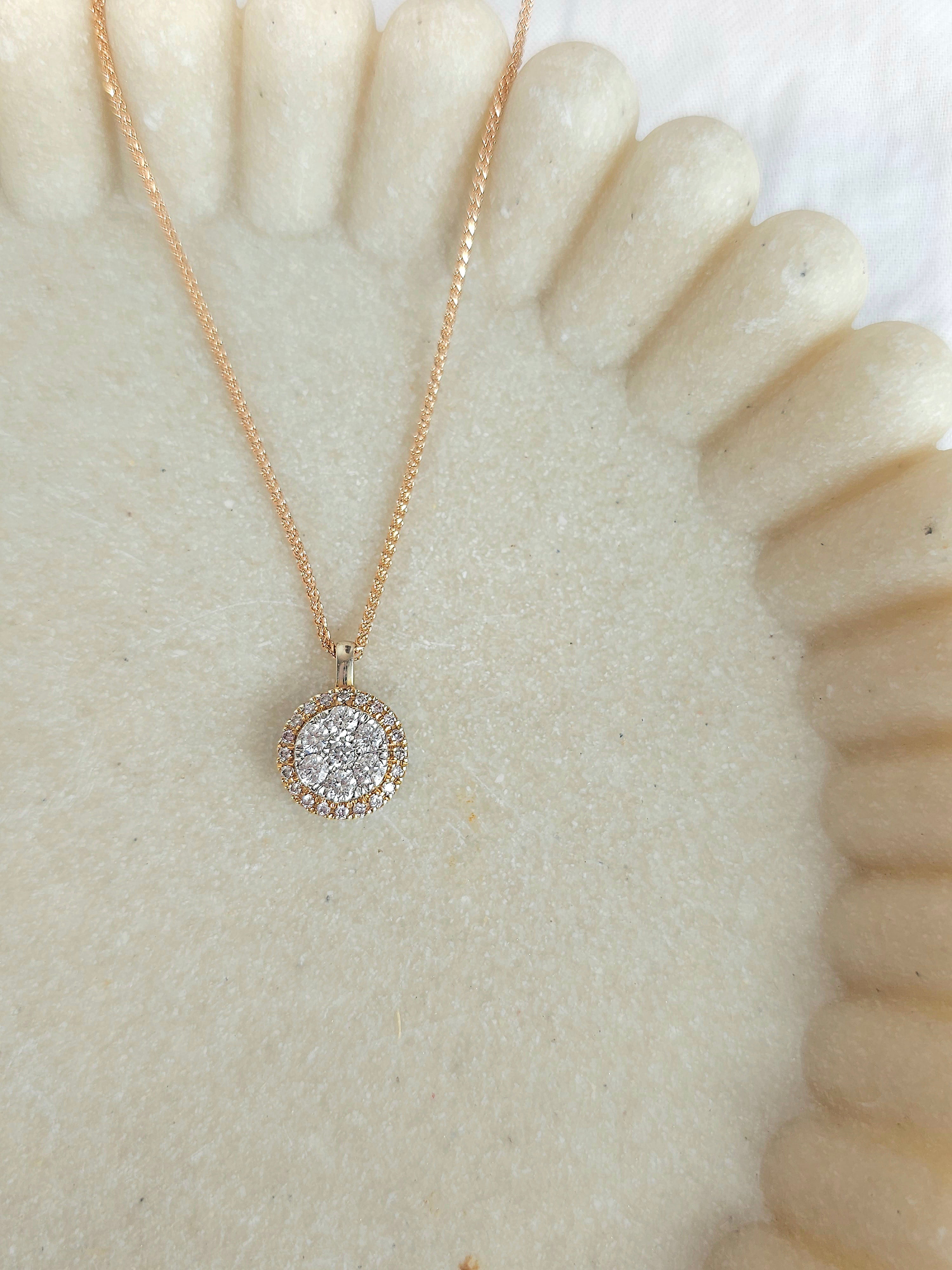 9ct Rose and White Gold Diamond and Pink Diamond pendant, 0.53ct total