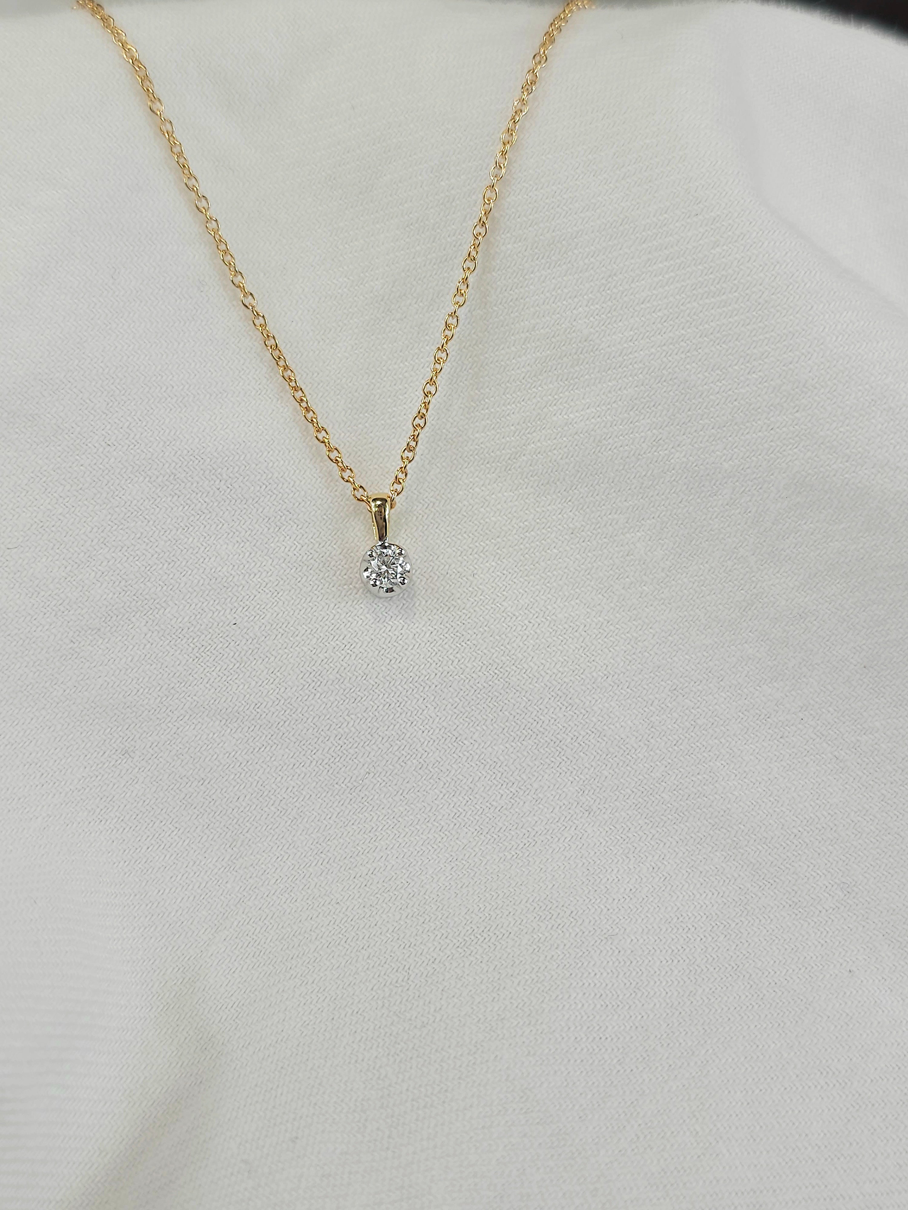 9ct Yellow and White gold Round Diamond pendant, 0.10ct total