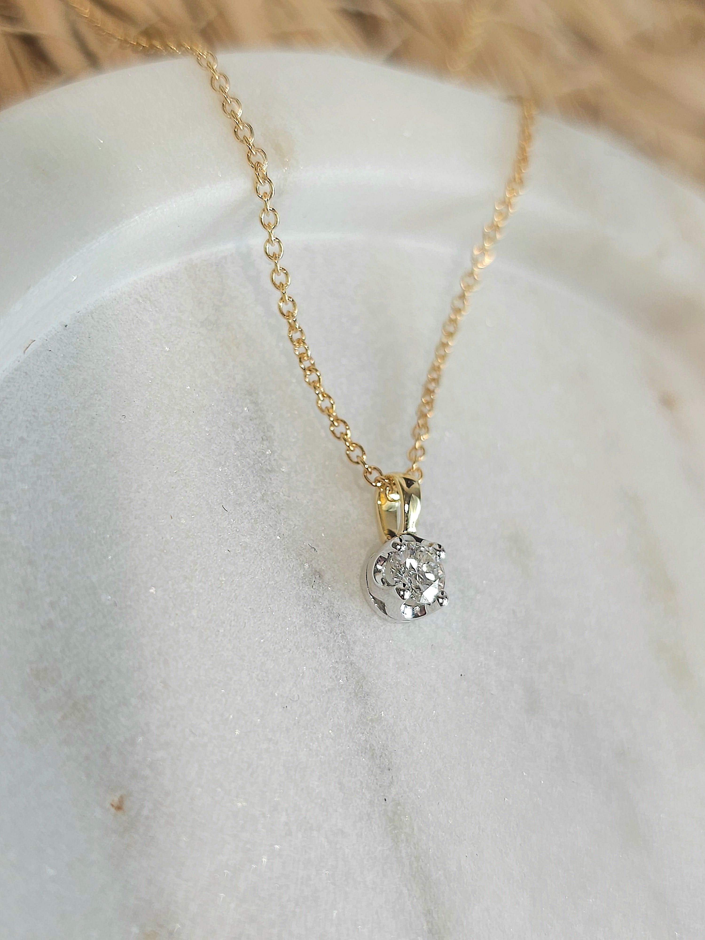 9ct Yellow and White Gold Round Diamond pendant, 0.20ct total