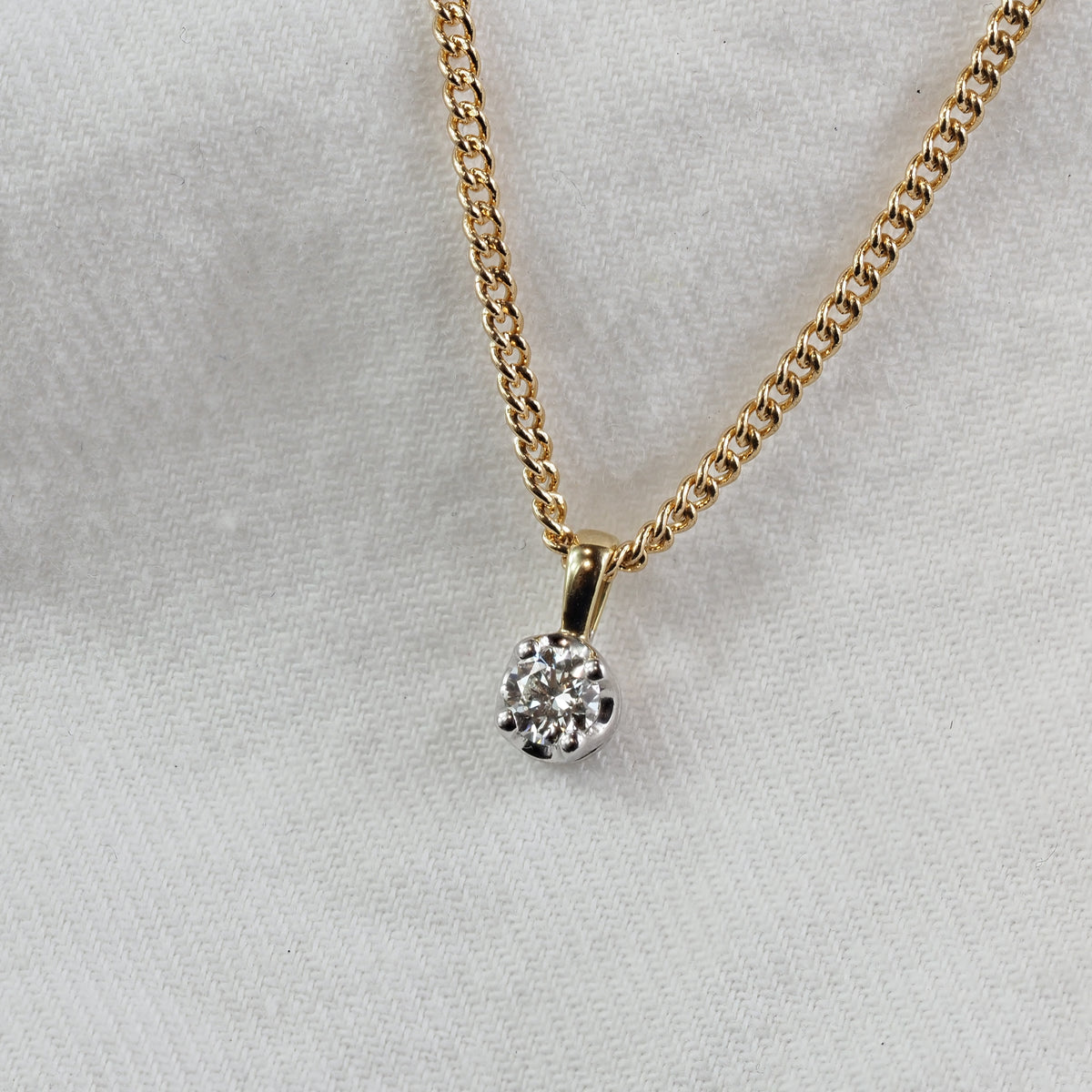9ct Yellow and White Gold Round Diamond pendant, 0.20ct total