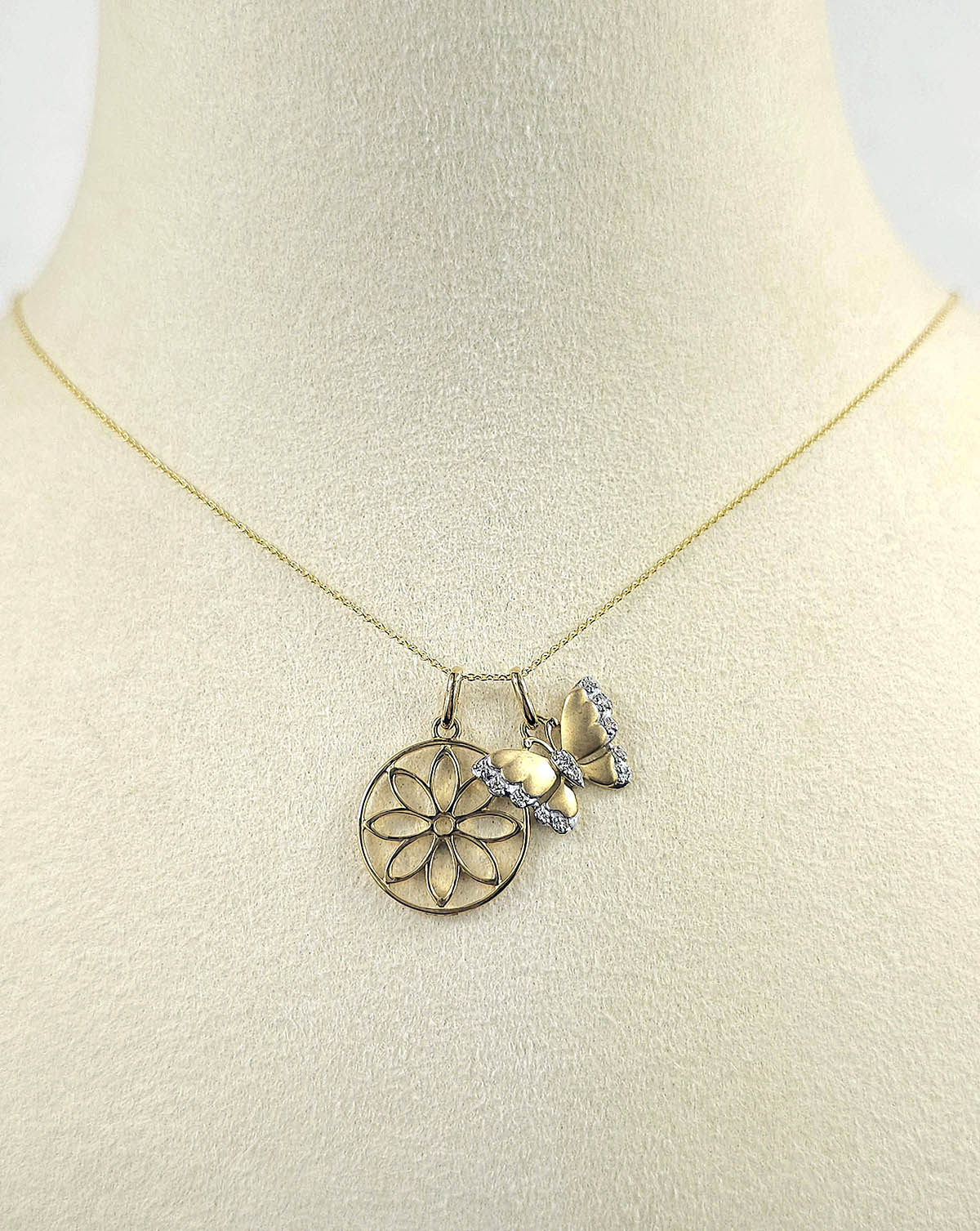 9ct Yellow and White Gold Diamond set Butterfly pendant and cut out flower pendant