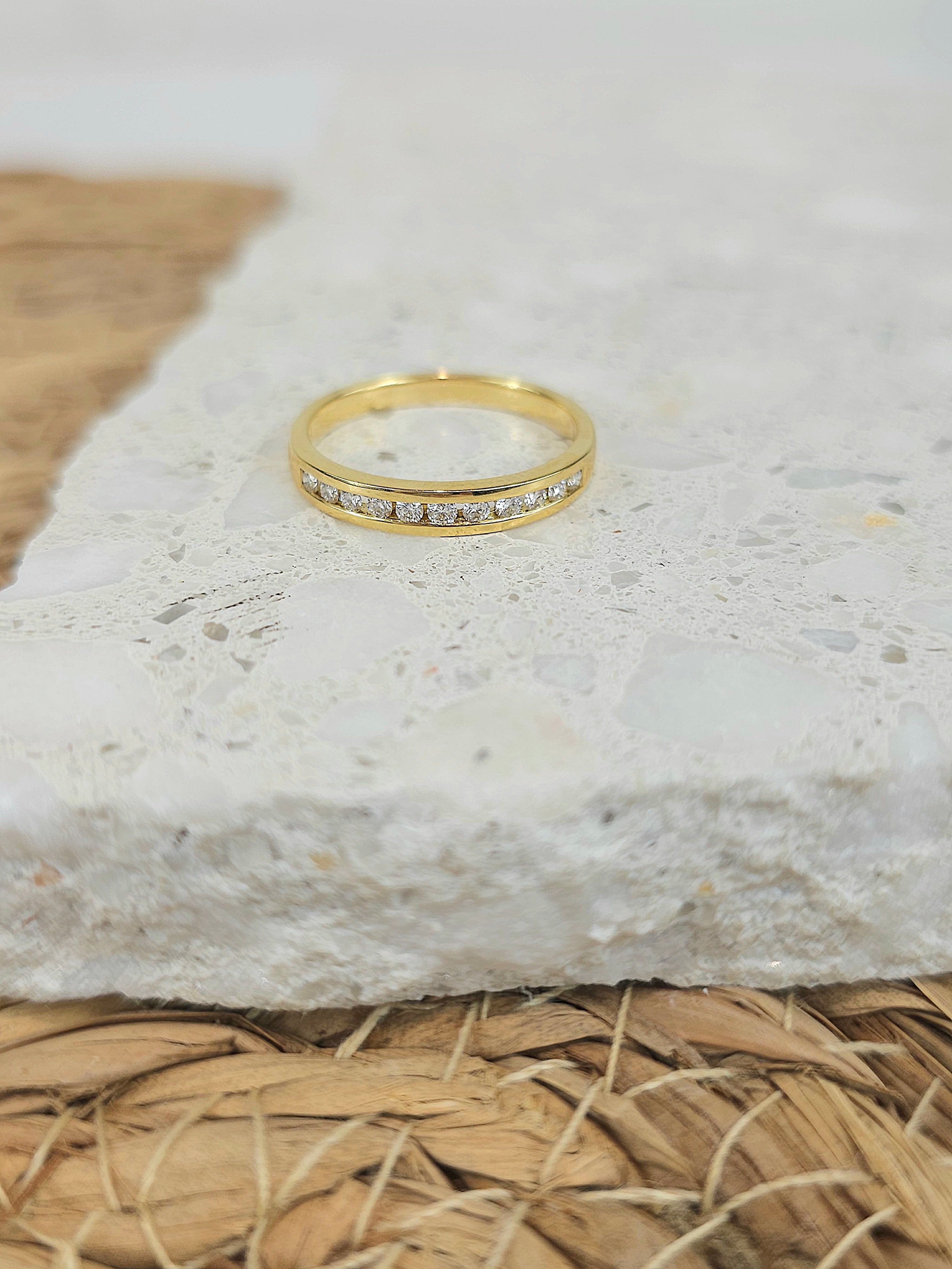 18ct Yellow Gold Round Brilliant cut Diamond channel set wedding band, equalling 0.22ct