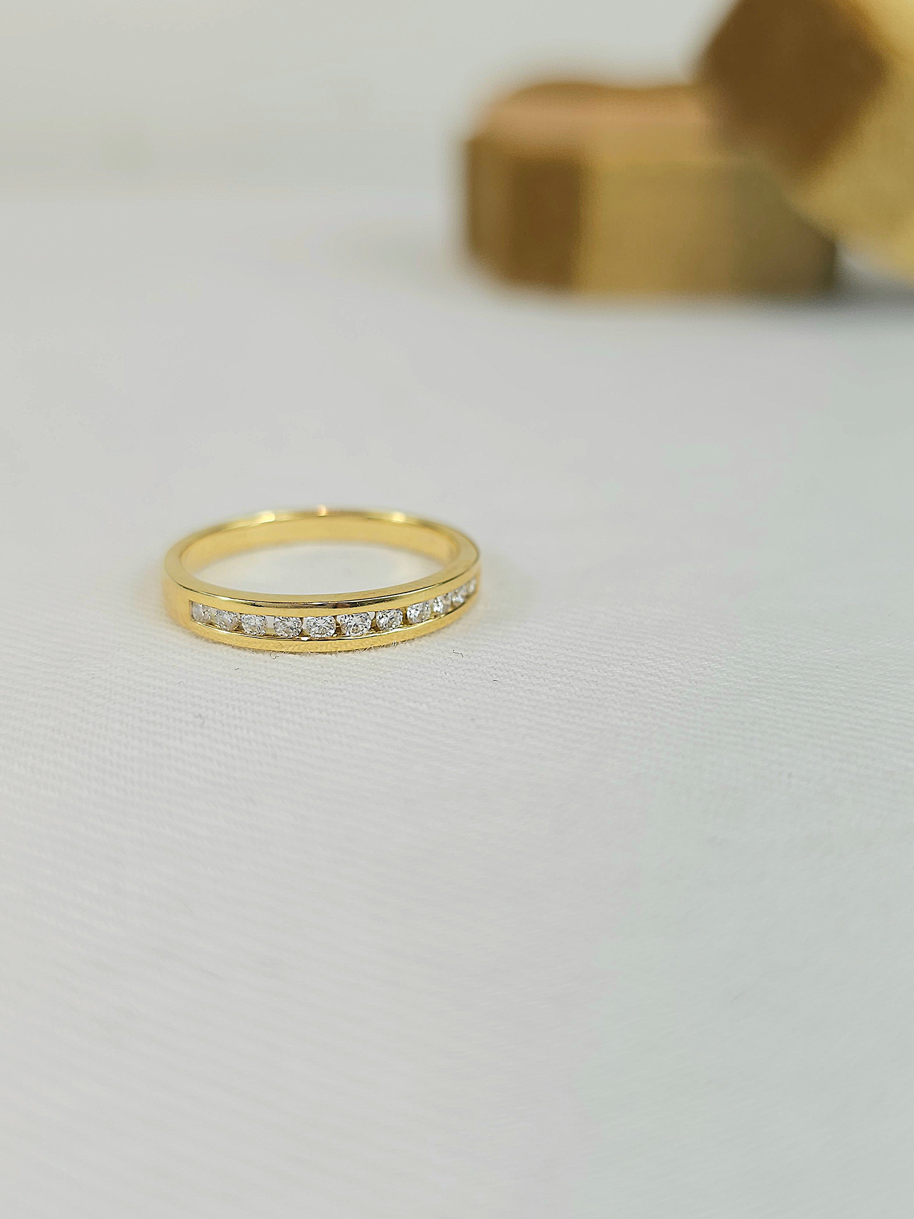 18ct Yellow Gold Round Brilliant cut Diamond channel set wedding band, equalling 0.22ct